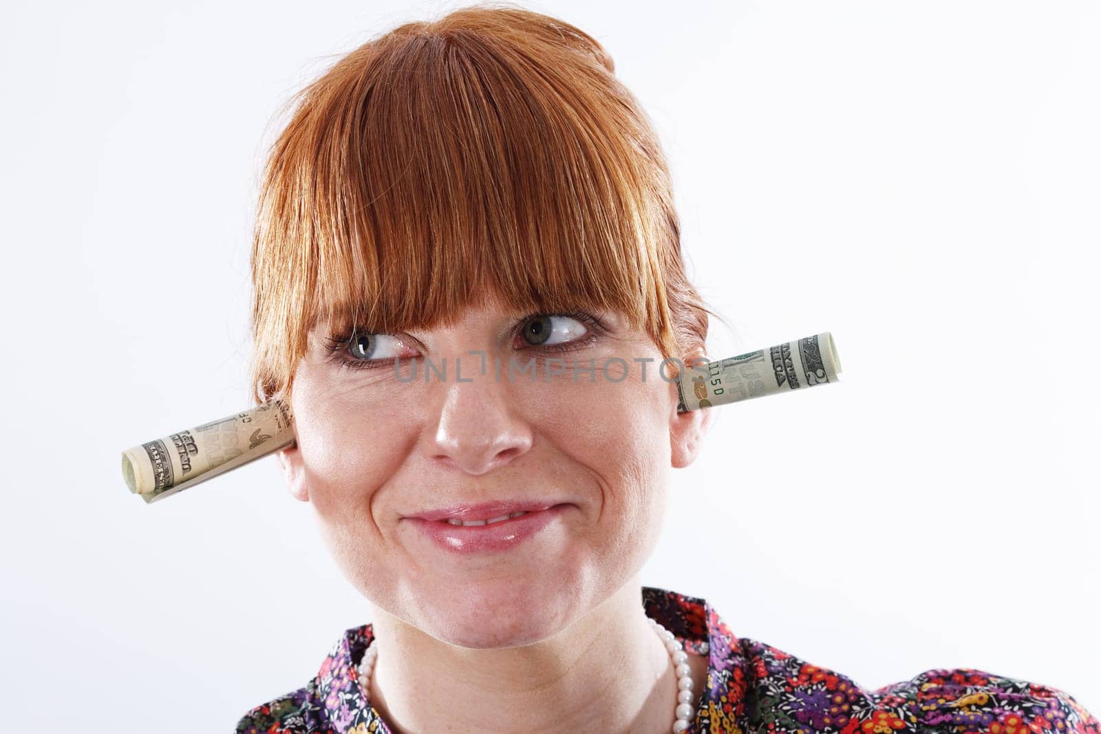 Rolled money in ears