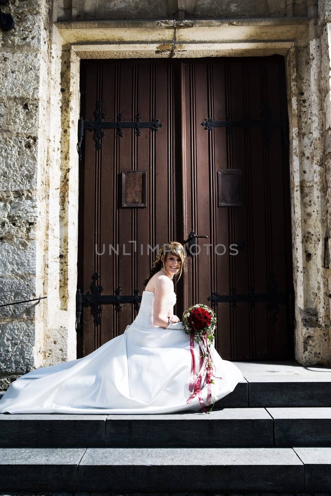 Another bride in front of the church gate