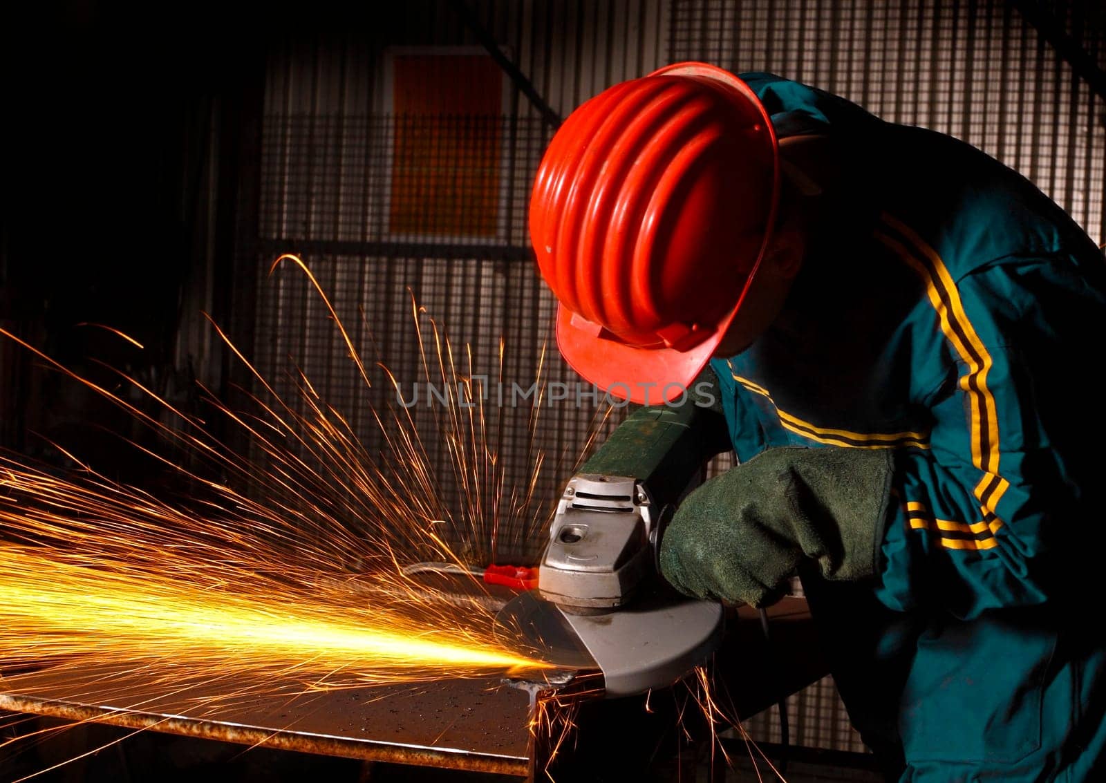 heavy industry manual worker with grinder 02