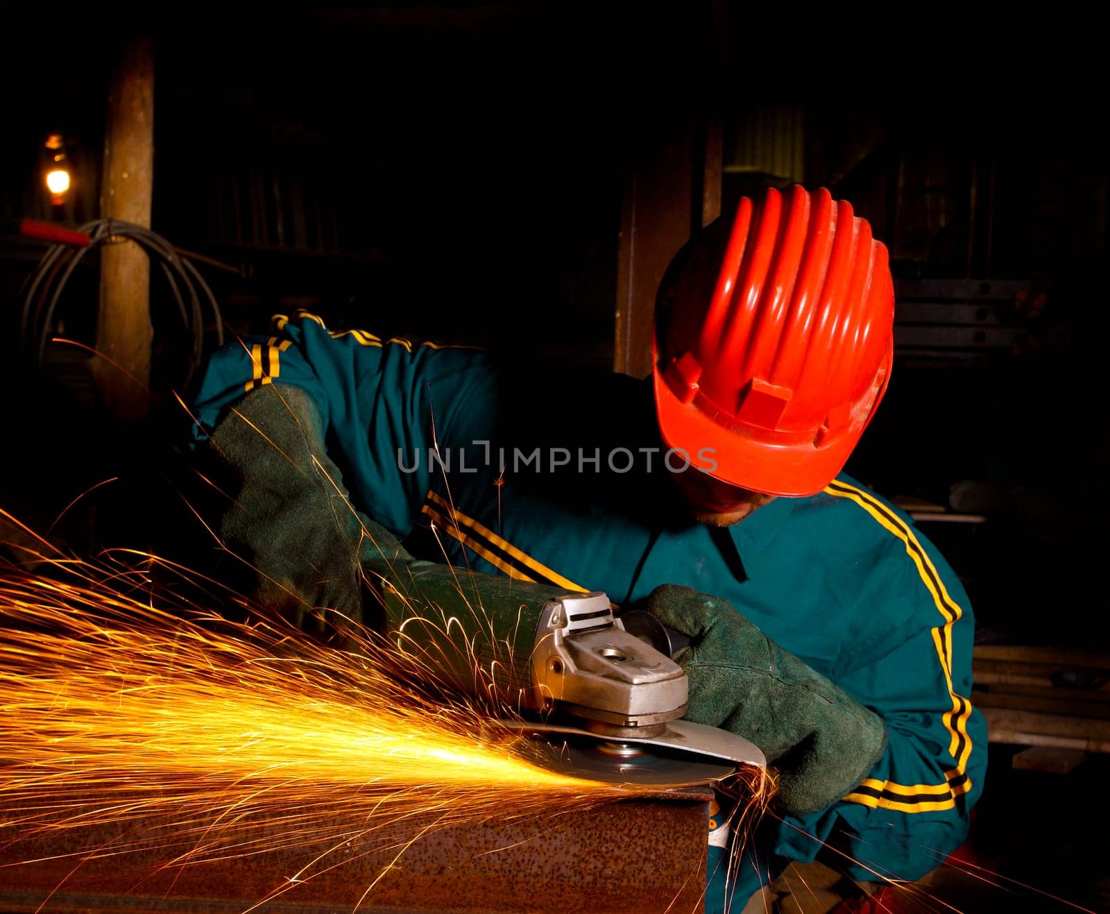 heavy industry manual worker with grinder 01