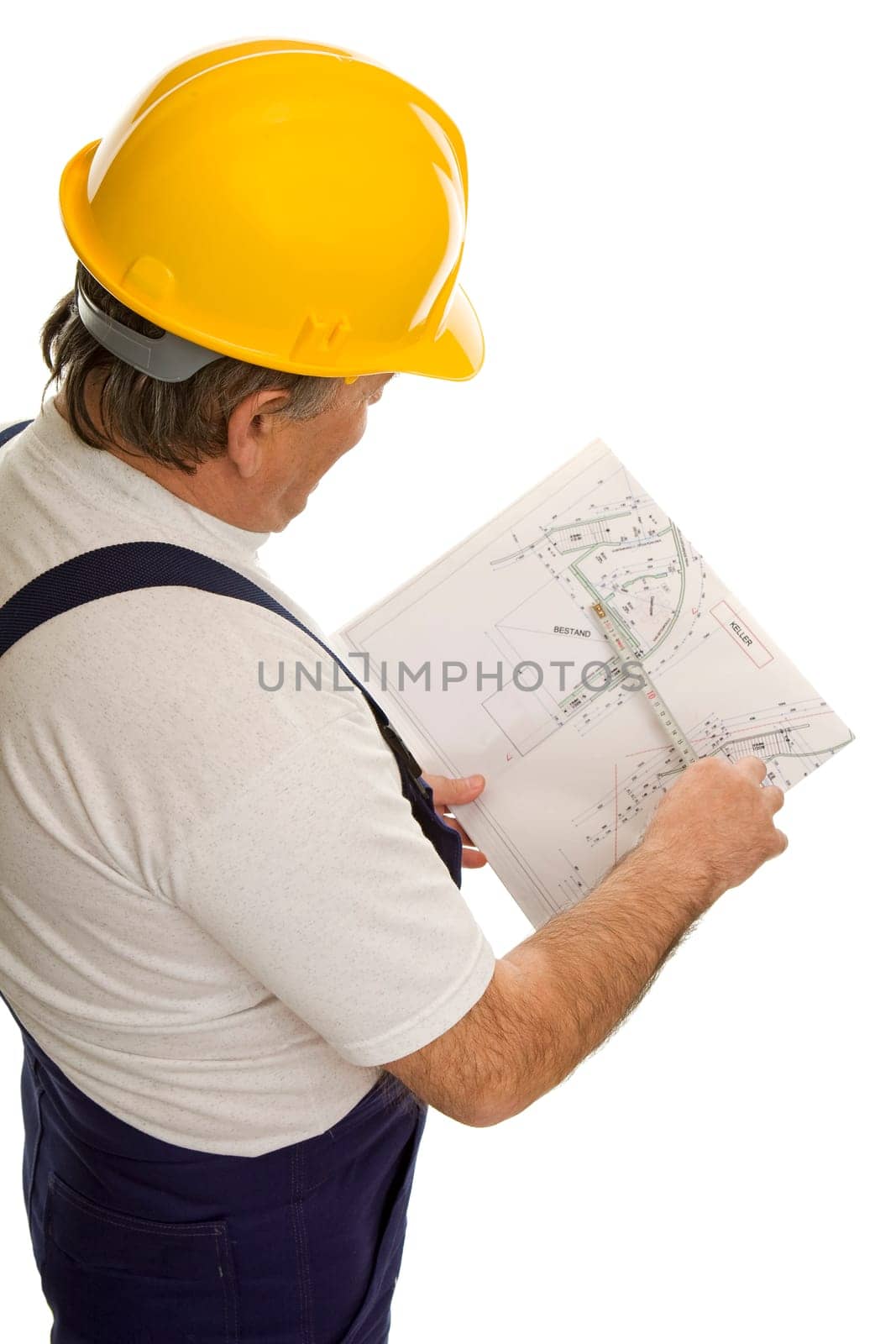 Construction worker with an architect's plan