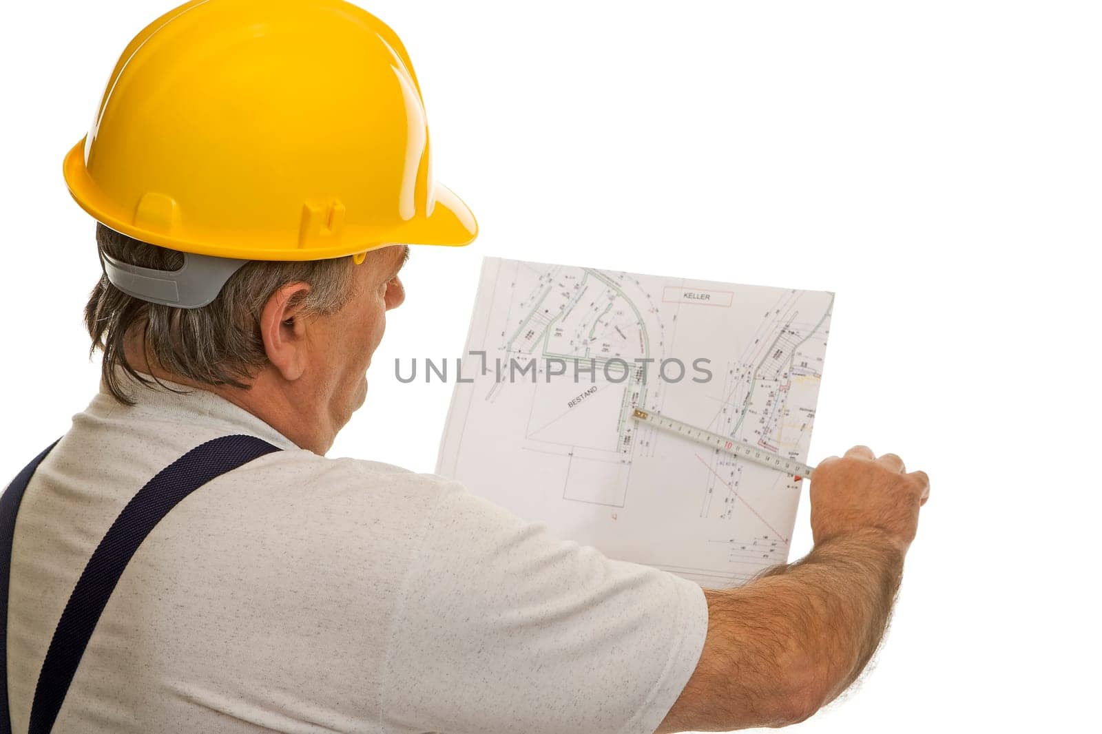 Construction worker with an architect's plan
