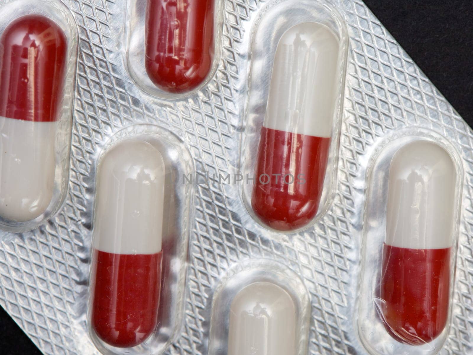 Red and white pill