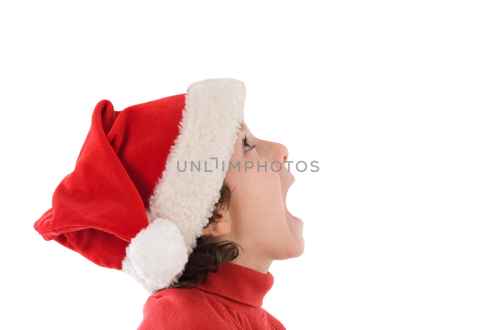 Profile of surprised boy in christmas