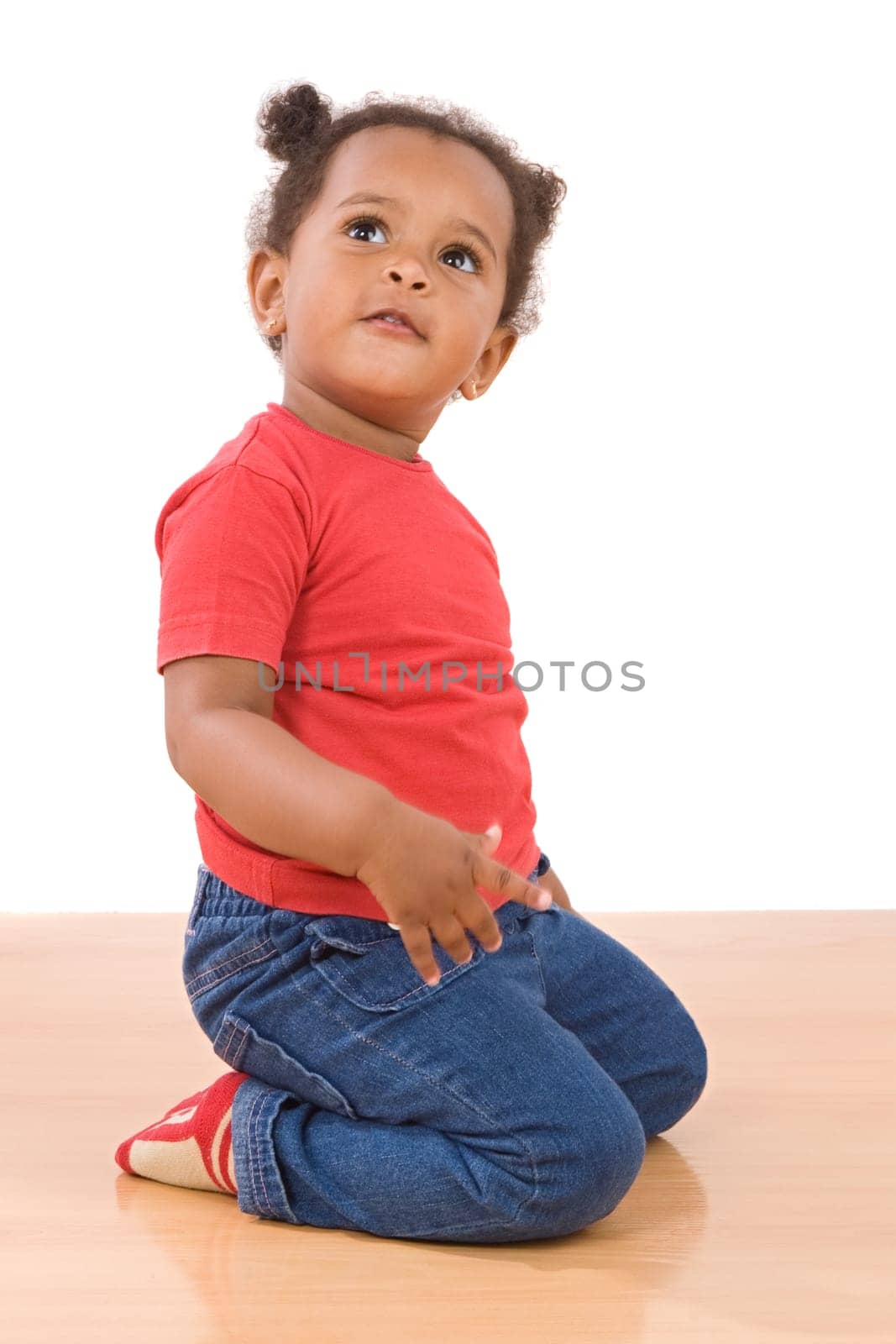 Adorable african baby kneel down