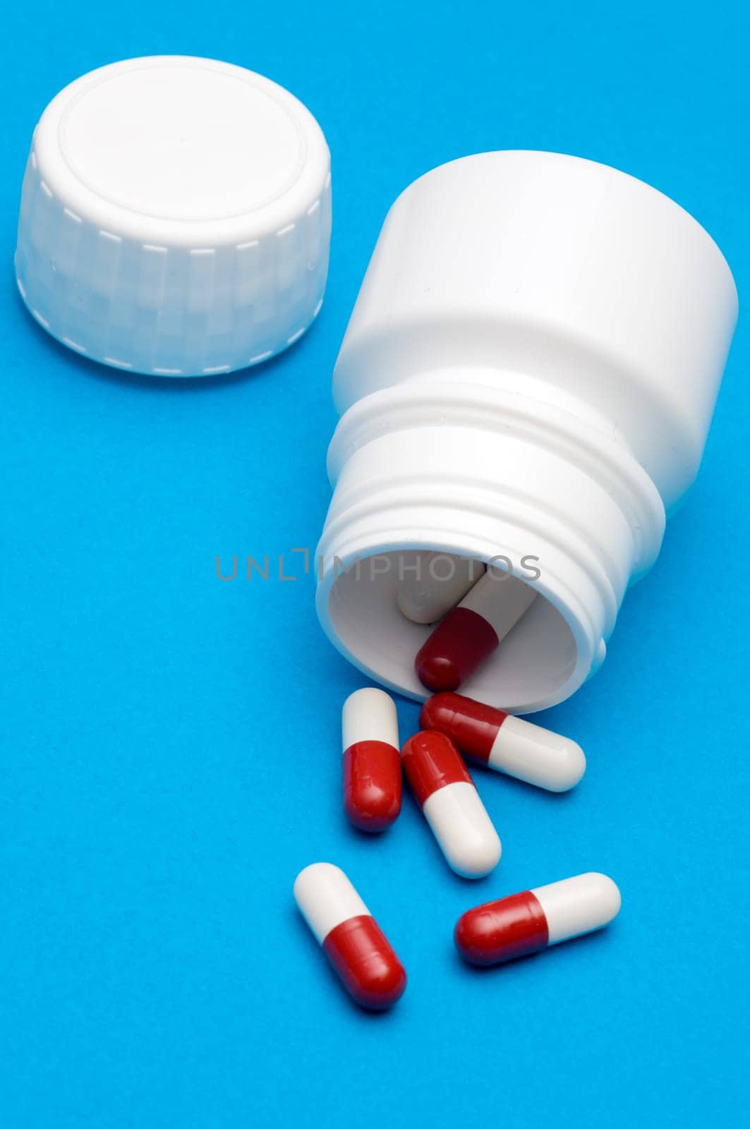 Red and white pill