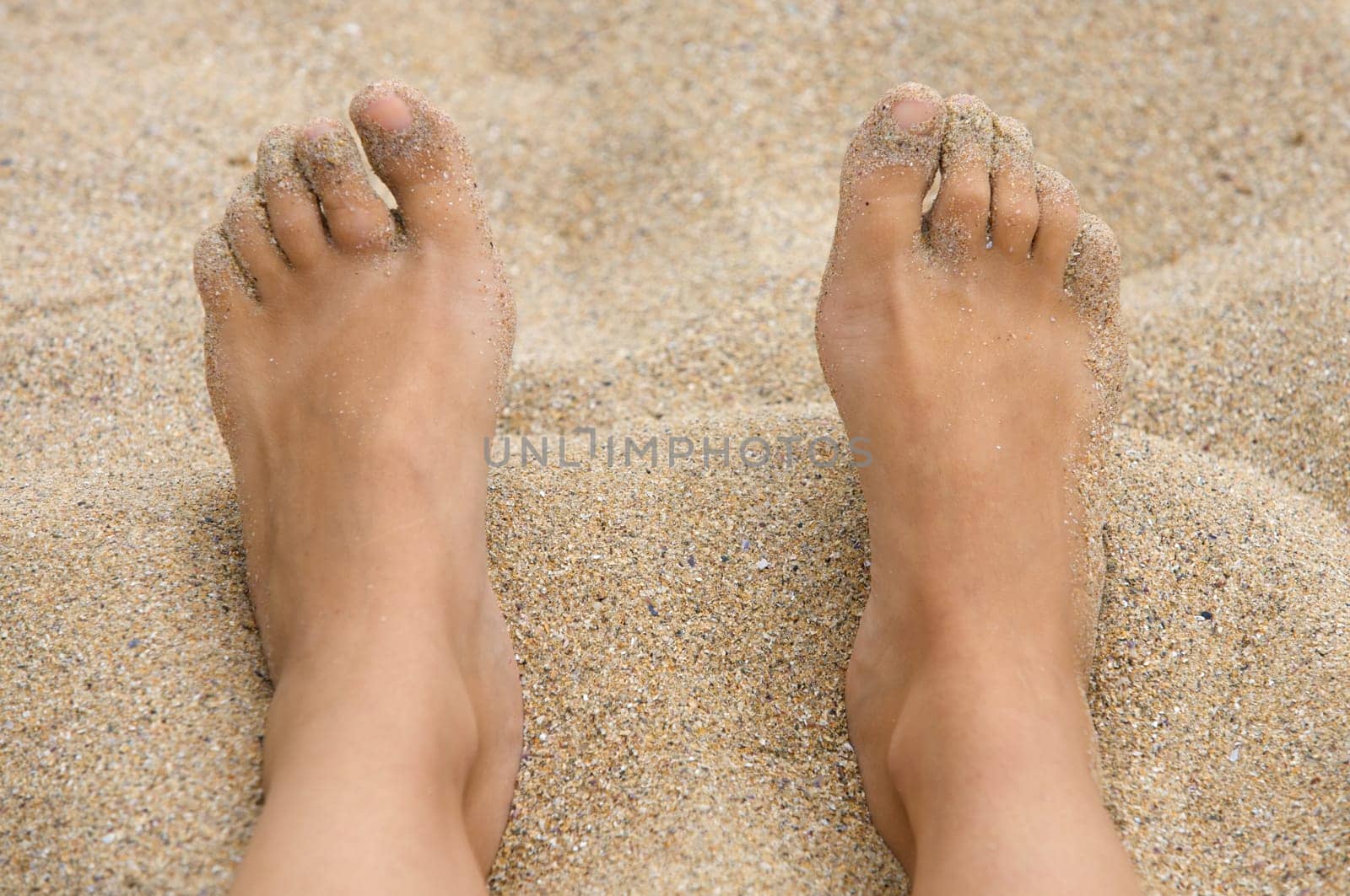 feet in the sand