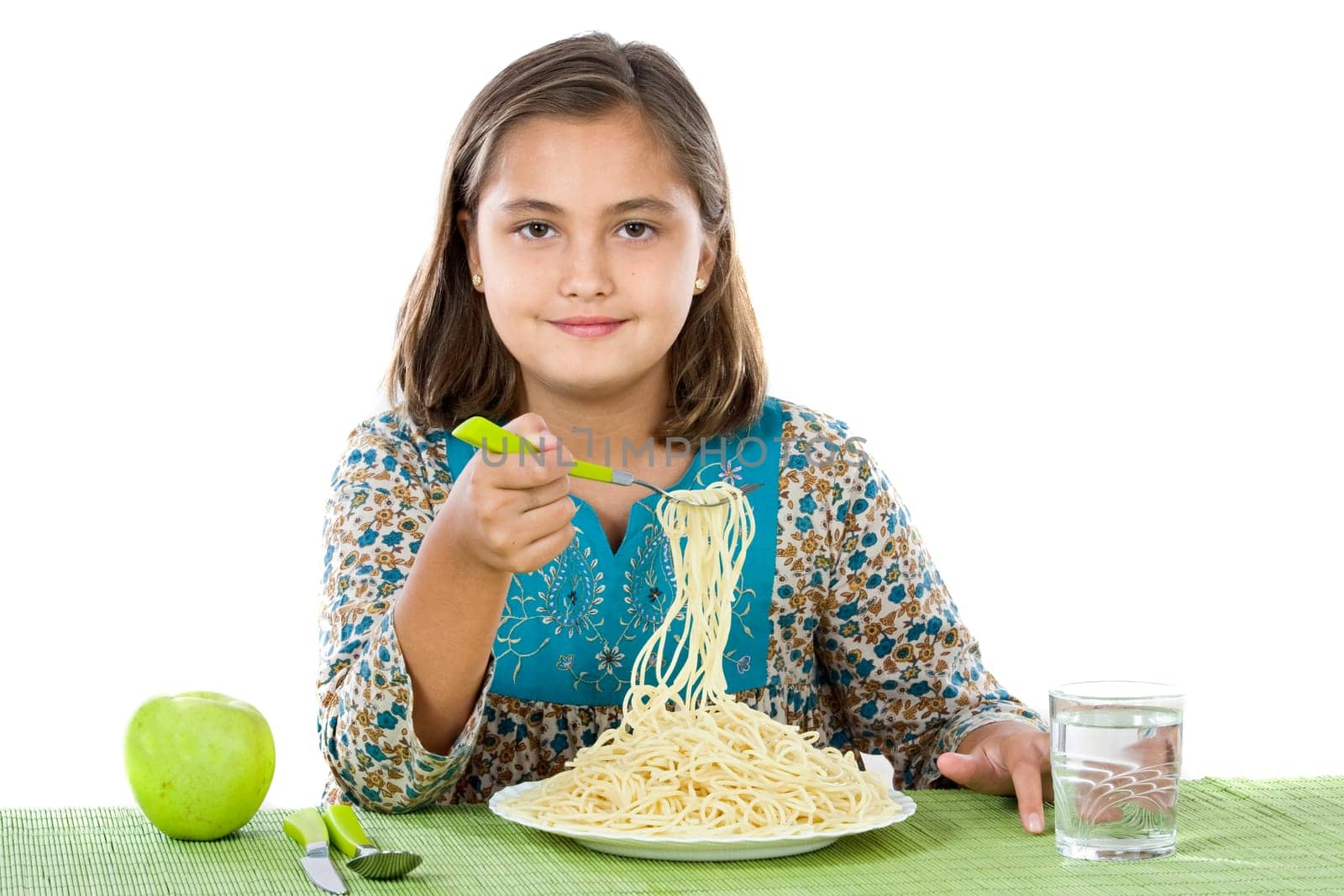 Precious girl eating spaghetti