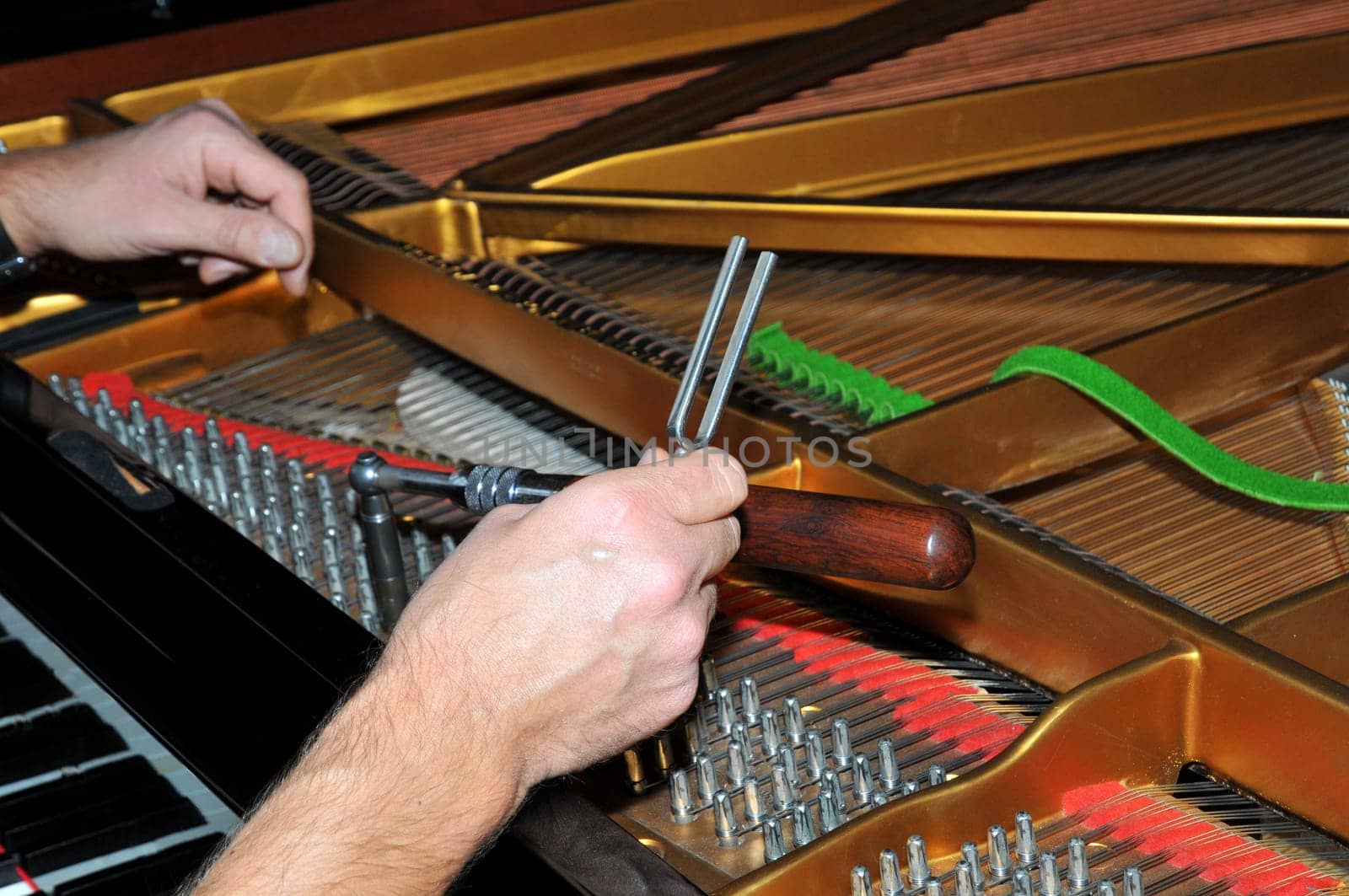 Tuning forks and tuning hammers are important tools for the piano tuner.