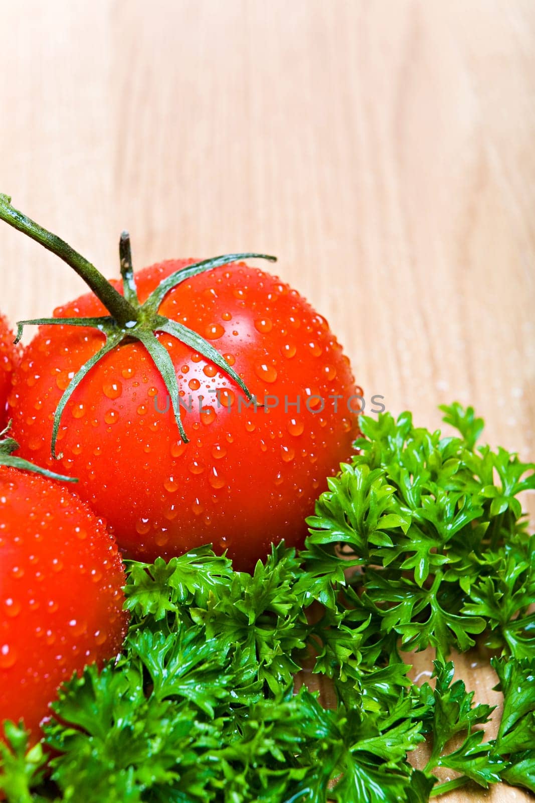 tomatoes and parsley on countertop