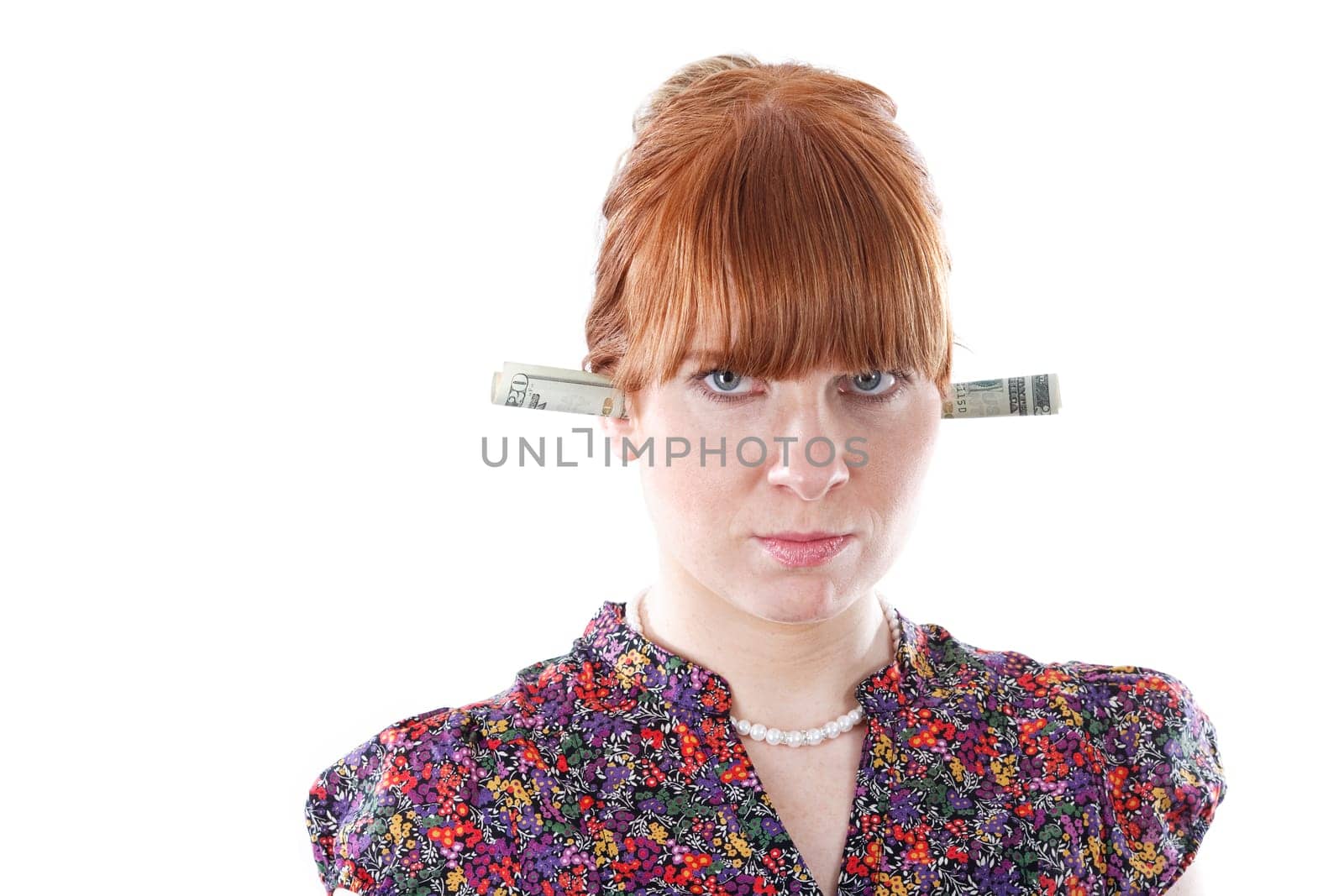 Woman with dollars in ear