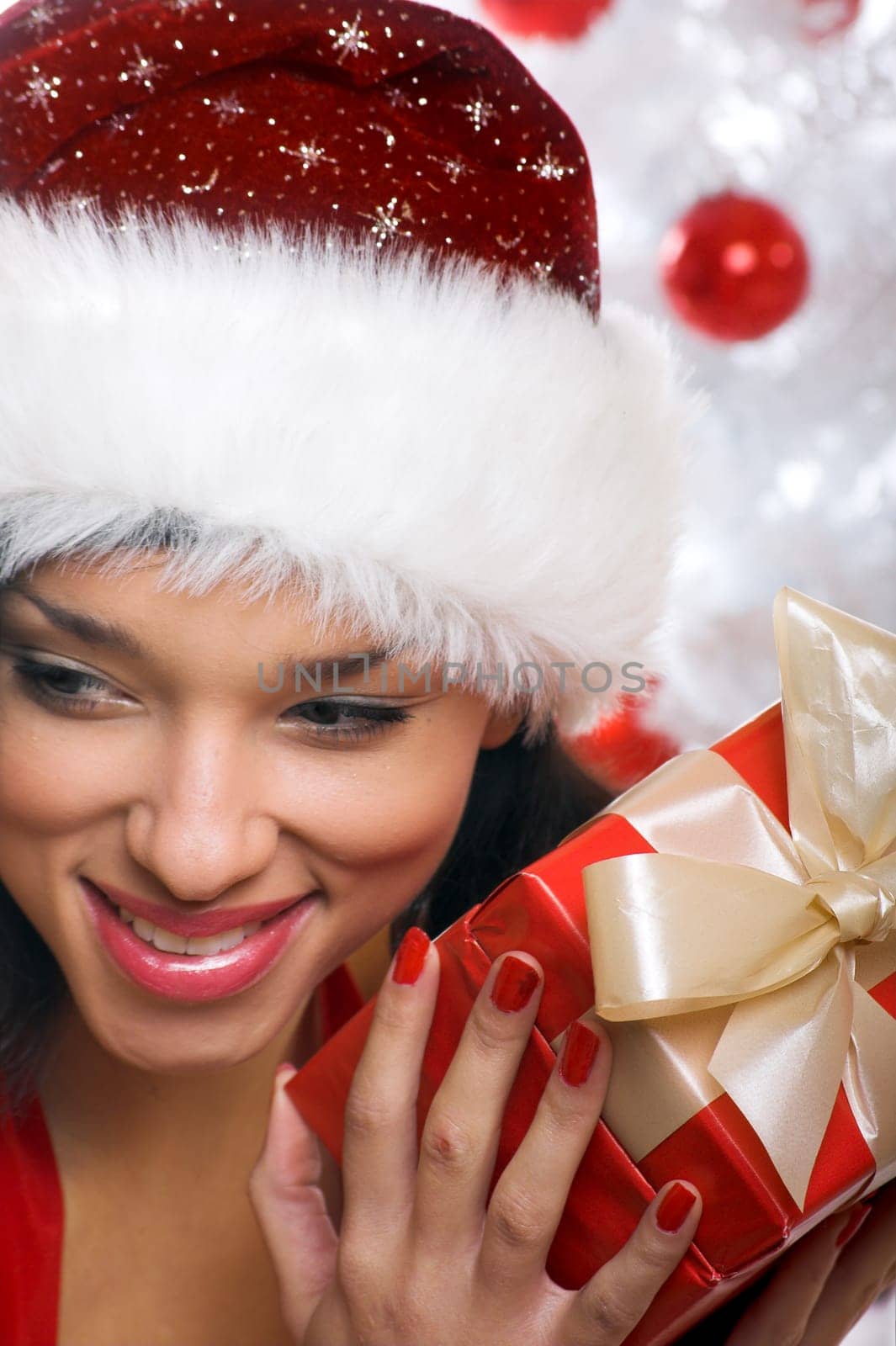 laughing santa claus with gift