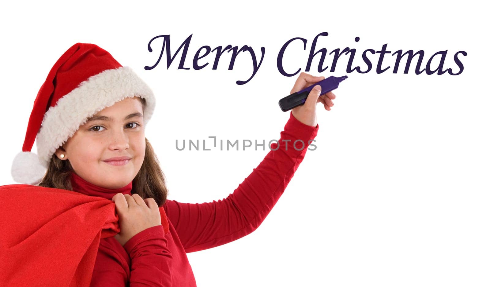 Beautiful girl writing Merry Christmas