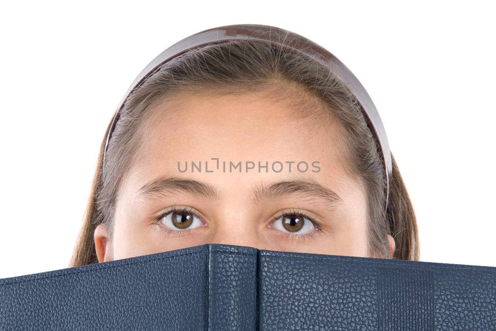 Adorable girl with a book