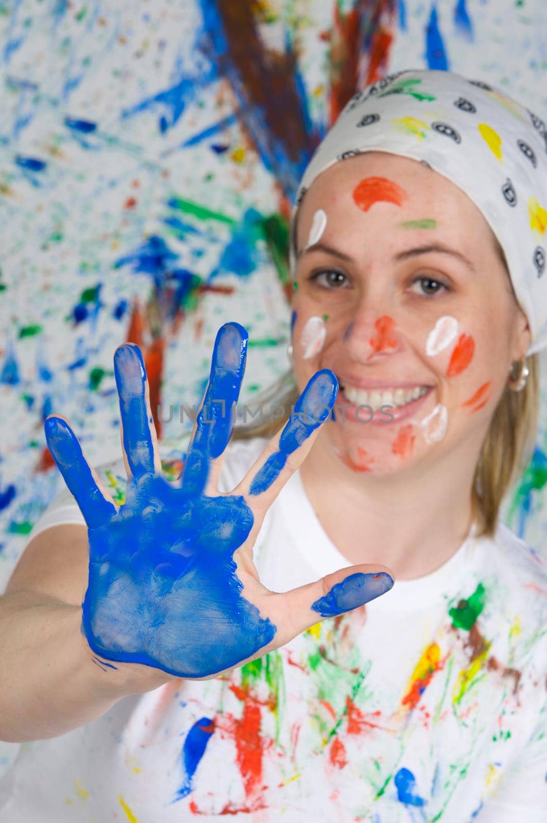 Attractive woman painting