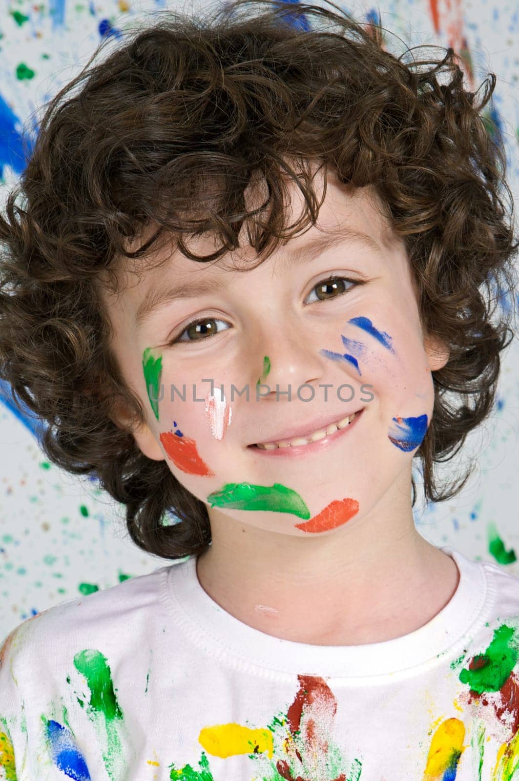 Boy playing with painting