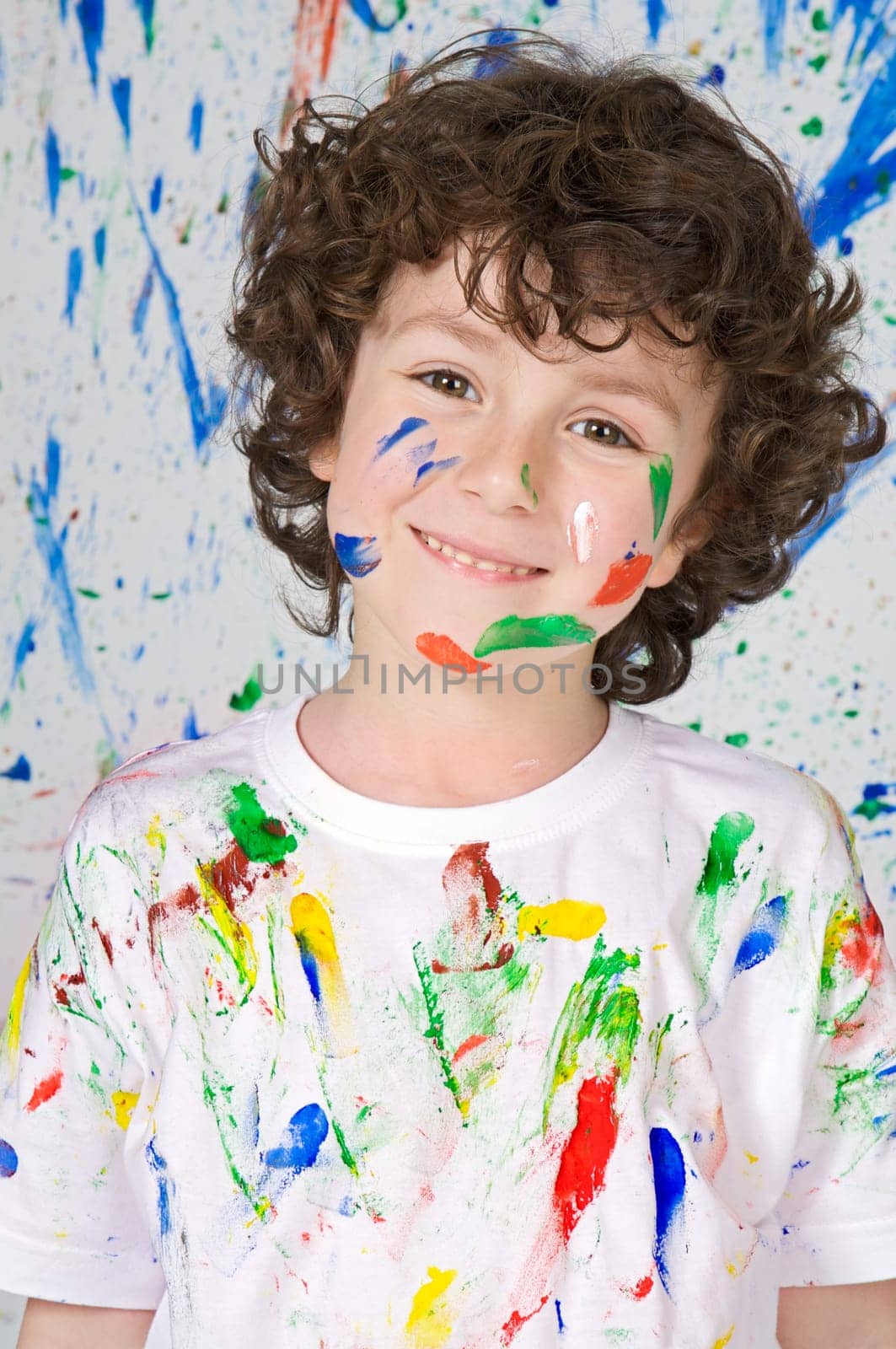 Boy playing with painting