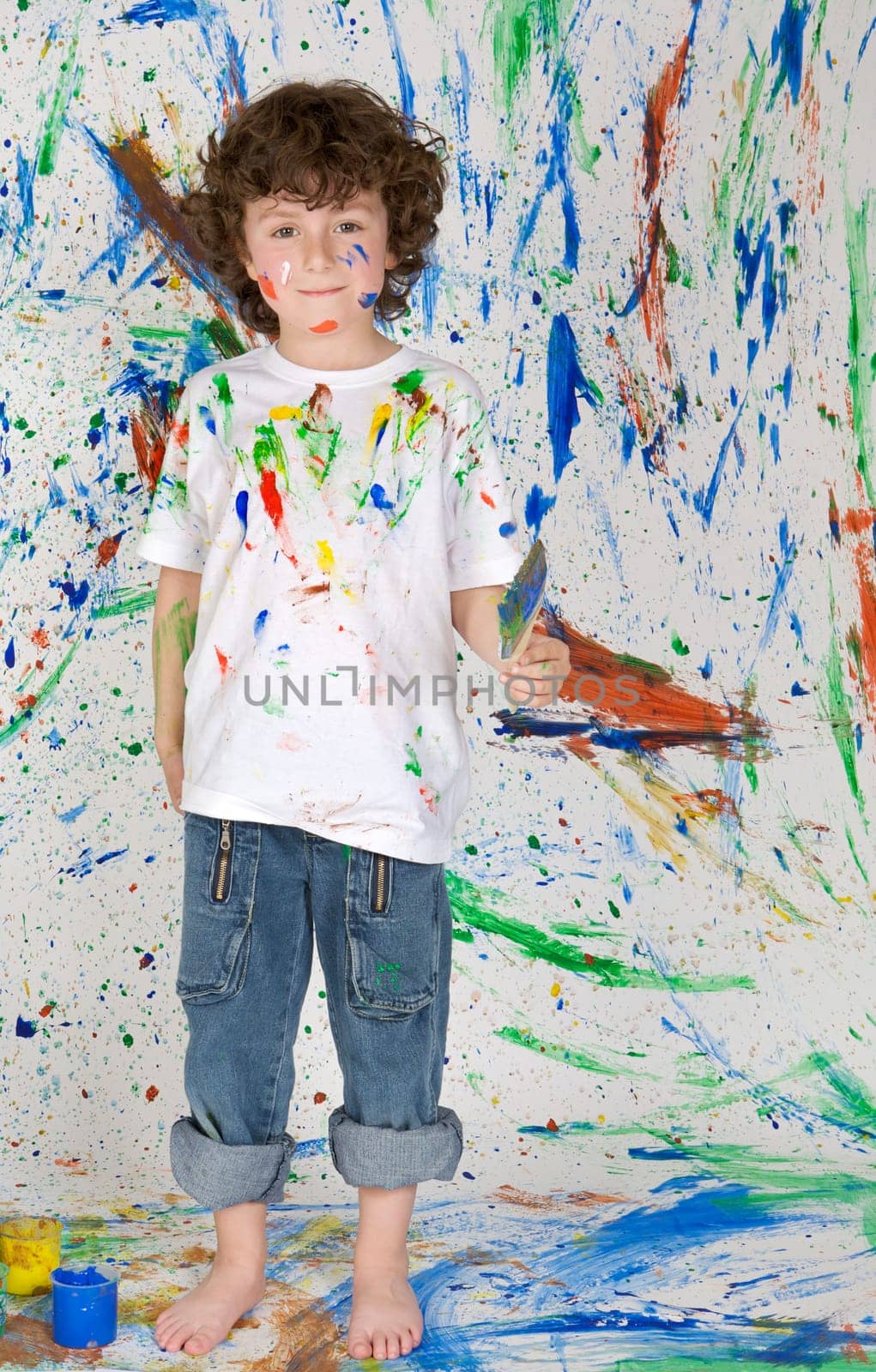 Boy playing with painting