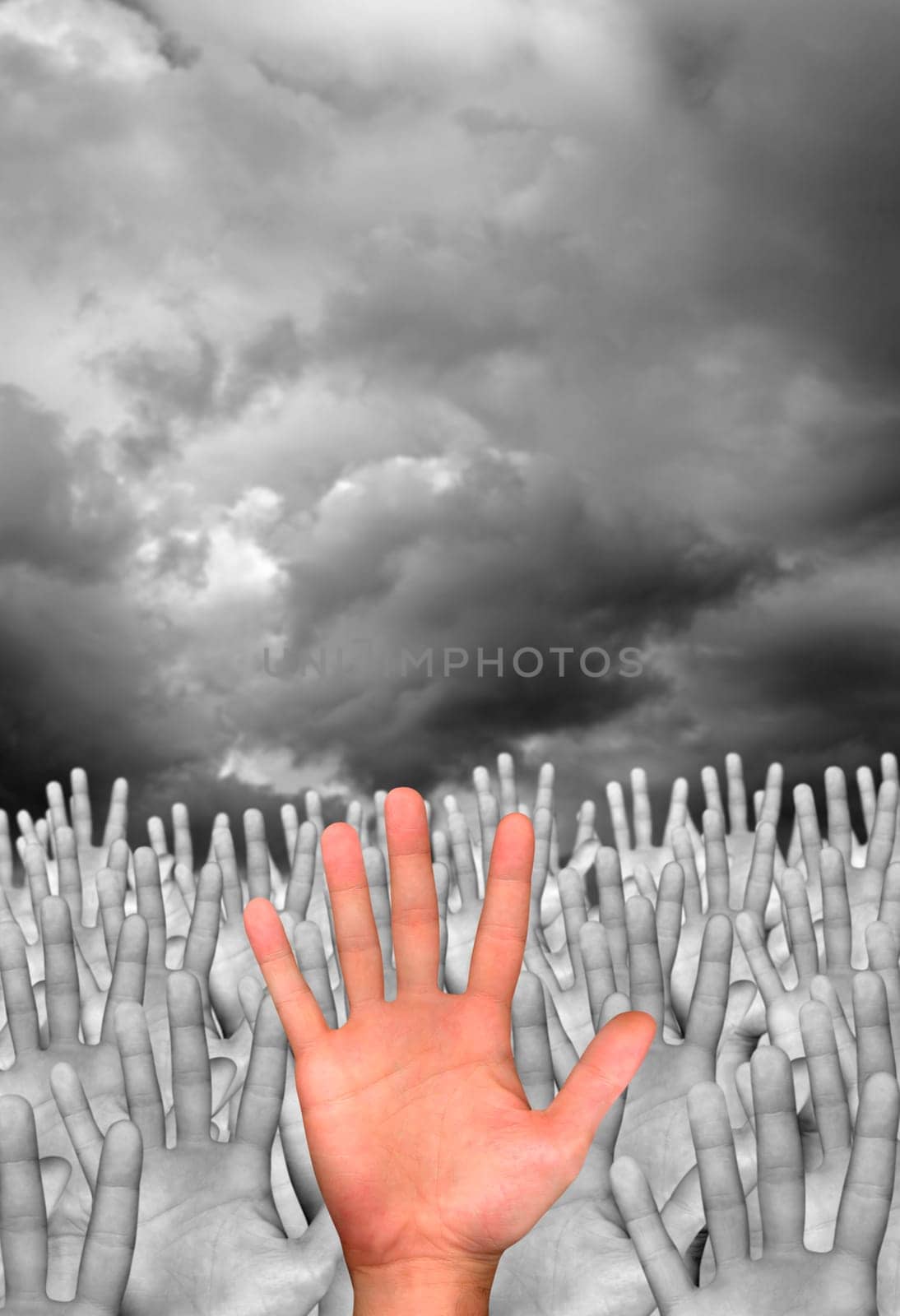 single hand in front of several hands