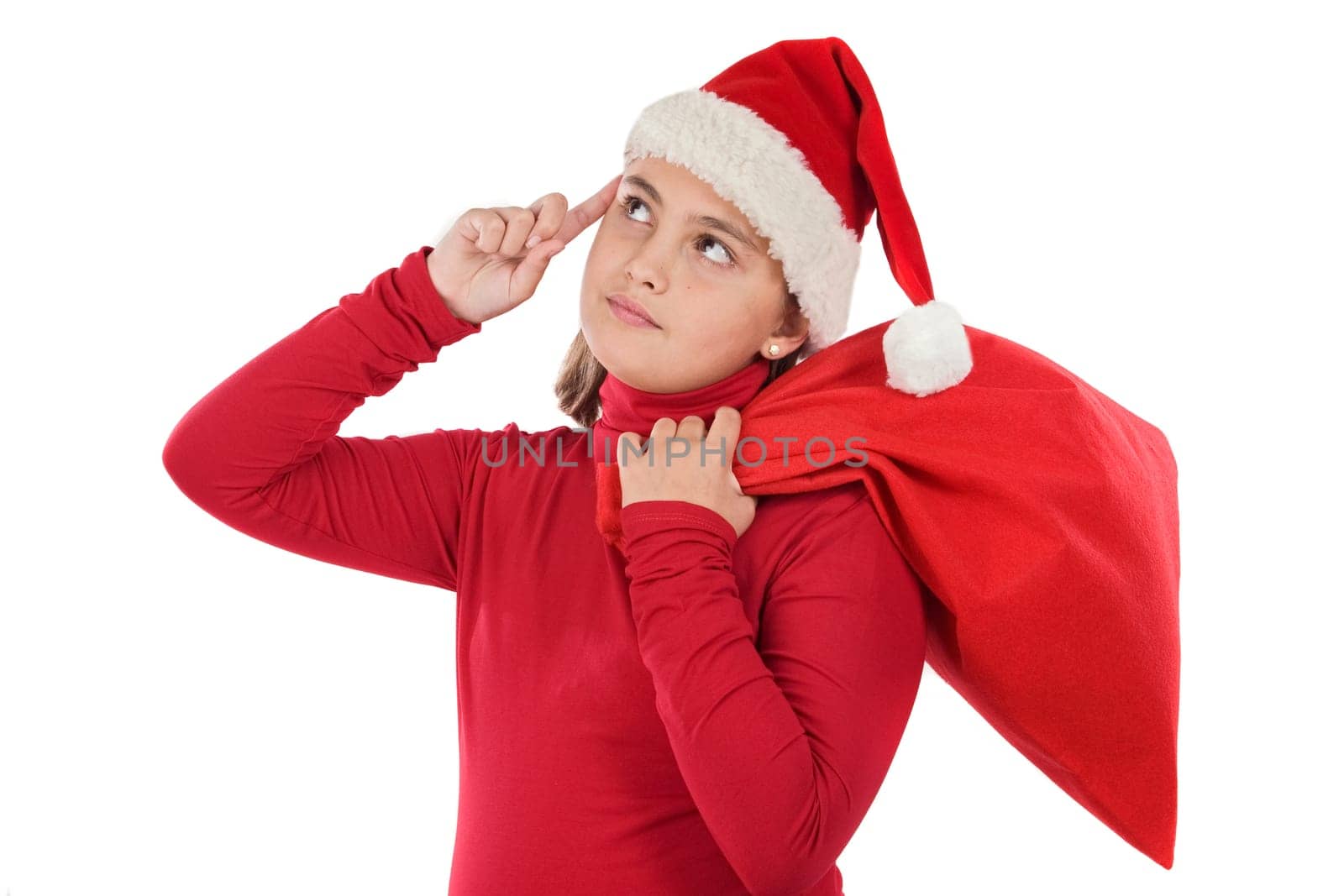 Beautiful girl in christmas thinking