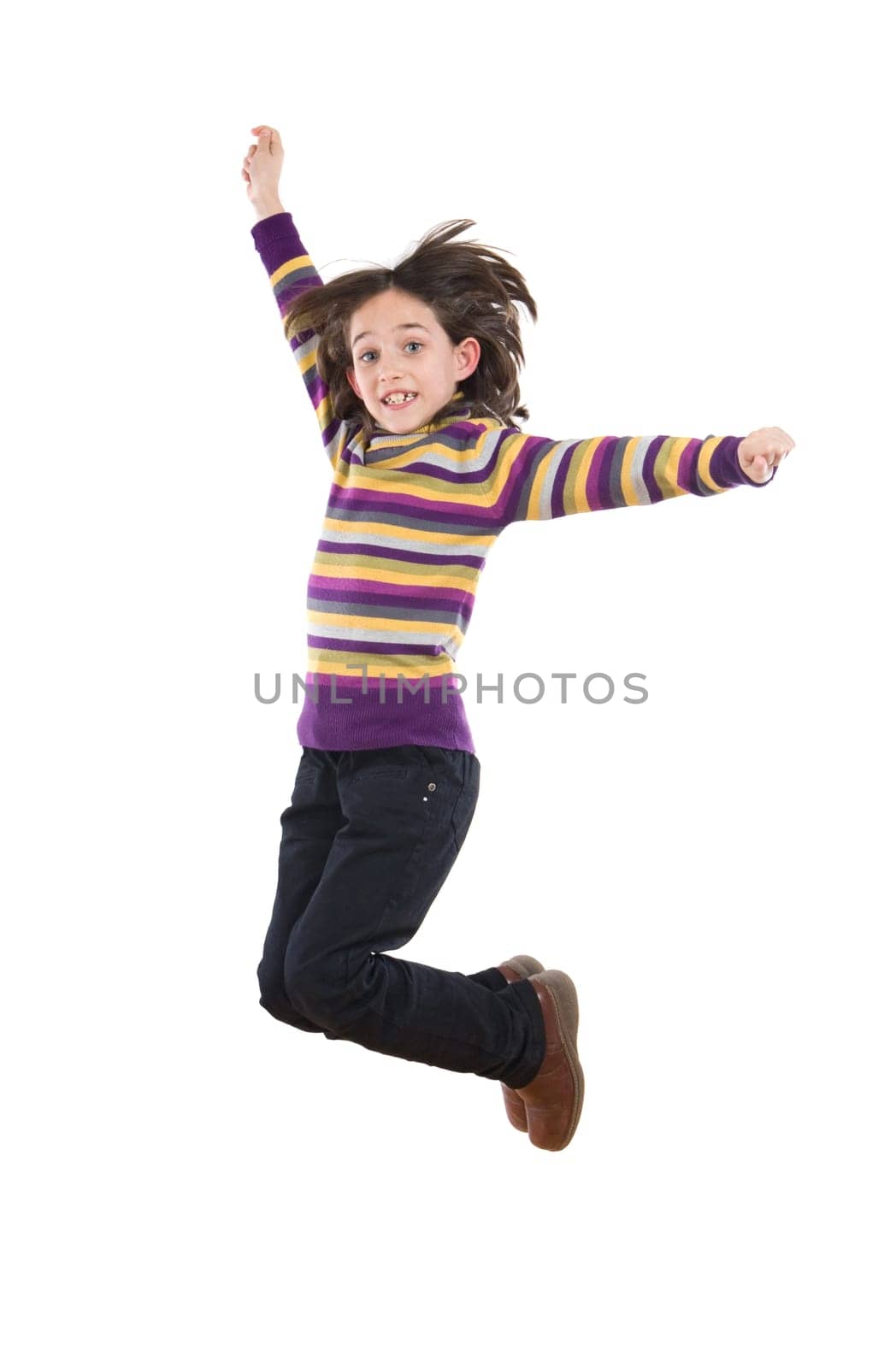 Joyful little girl jumping