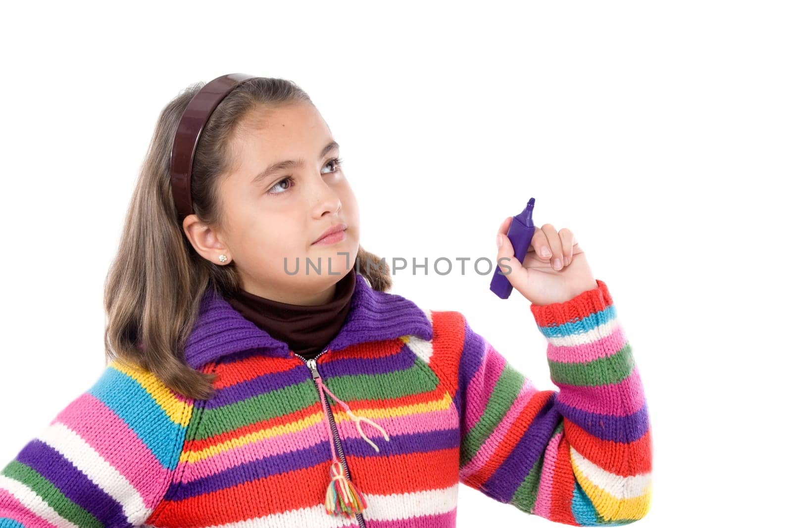 Adorable girl writing with fluorescent