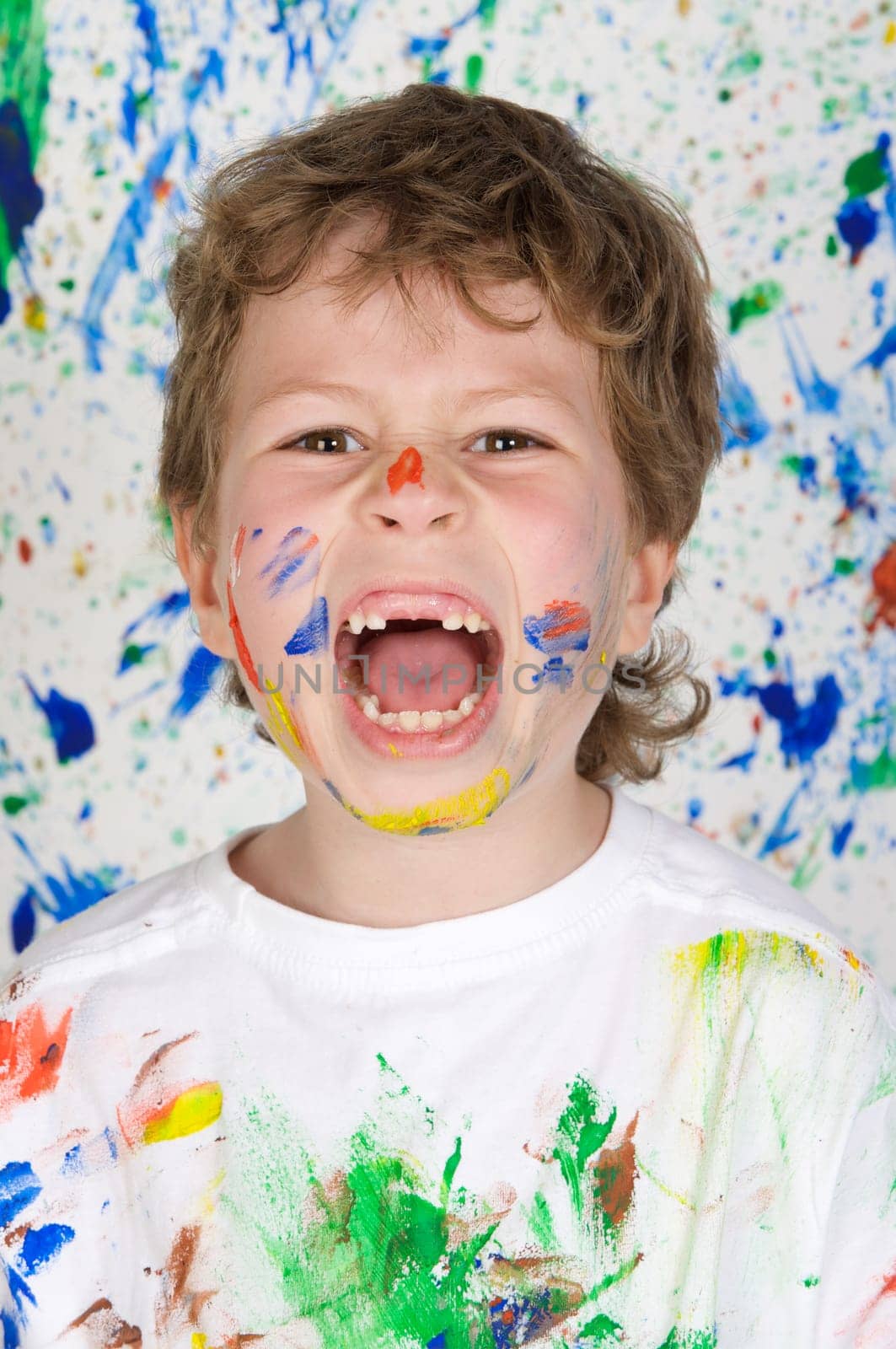 Boy playing with painting
