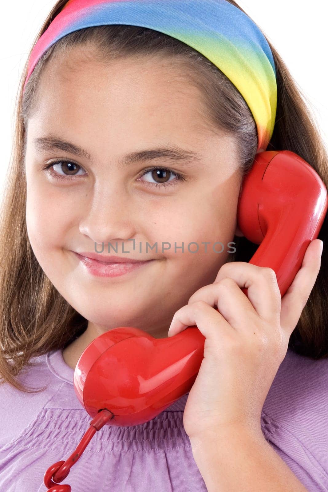 Beautiful girl with red telephone
