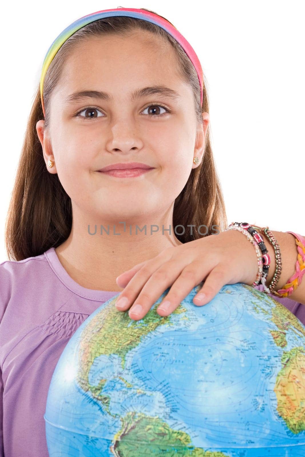 Adorable girl with a globe of the world