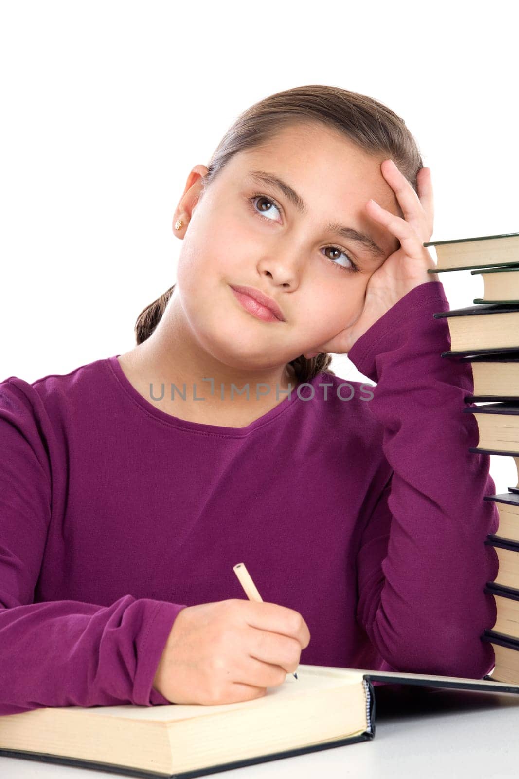 Adorable girl with many books thinking