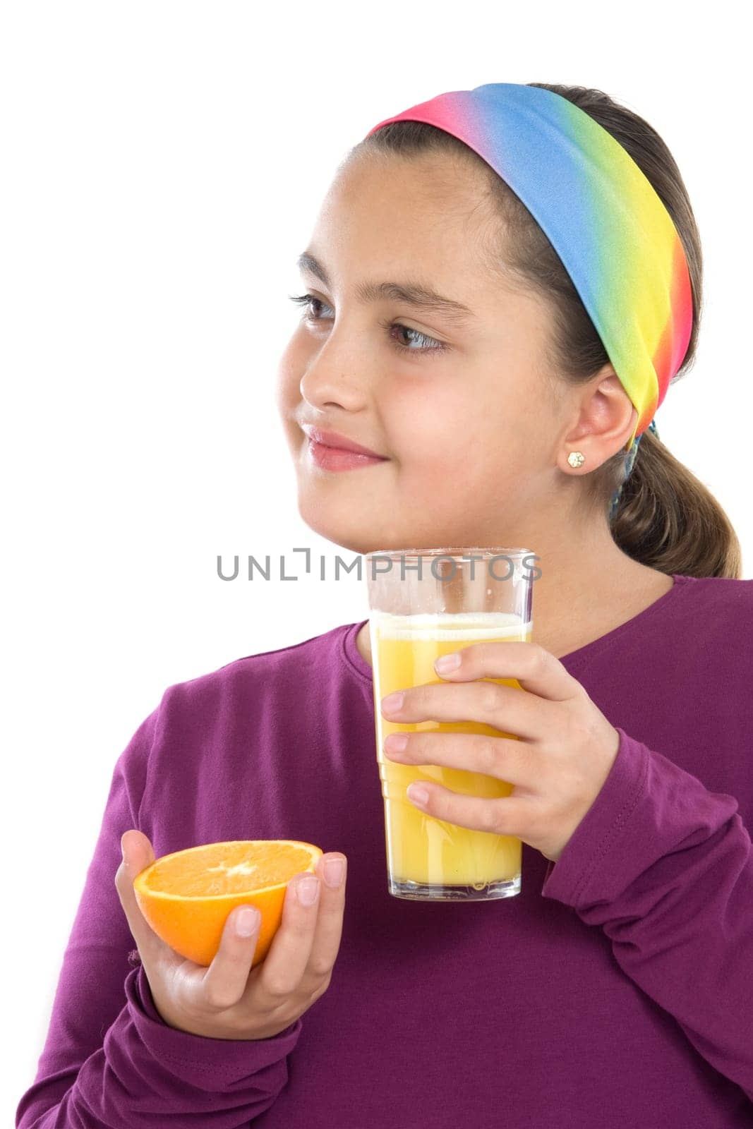 Attractive girl with oranges