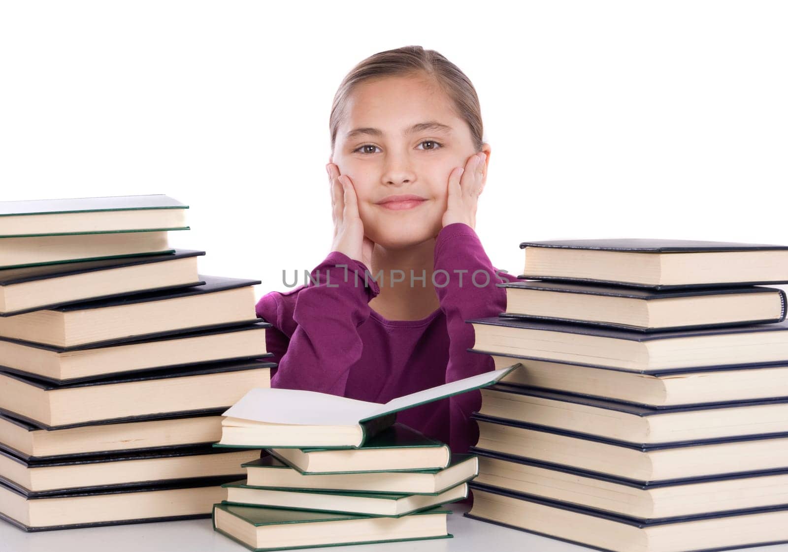 Adorable girl with many books