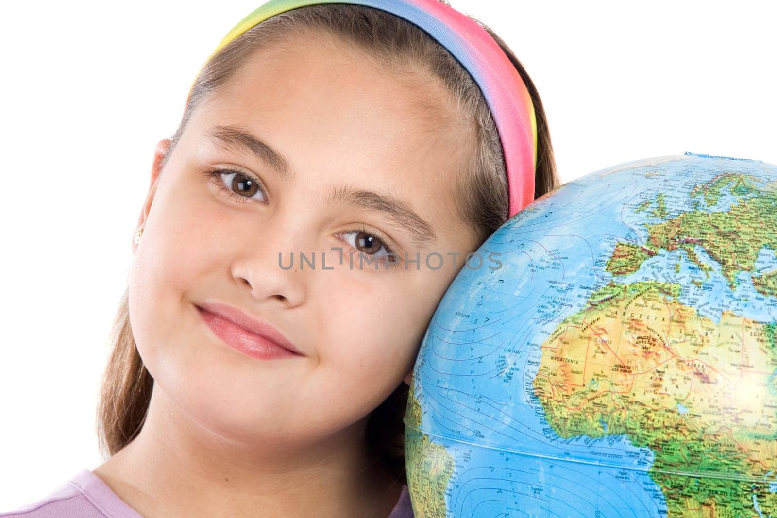 Adorable girl with a globe of the world