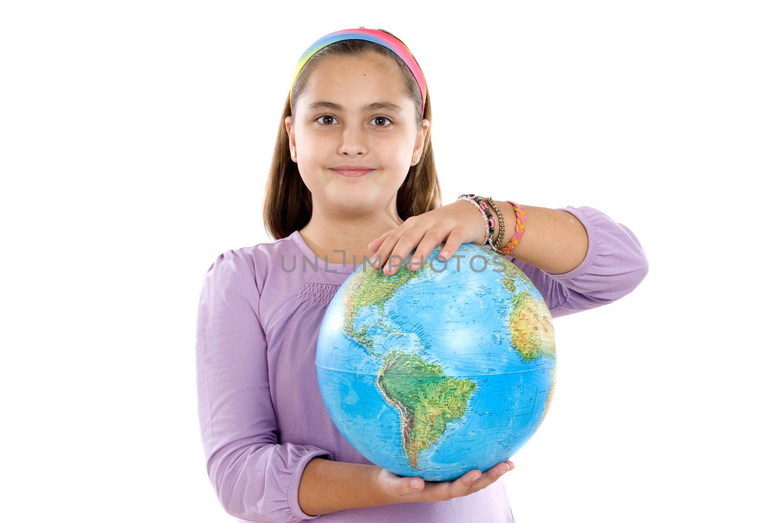 Adorable girl with a globe of the world