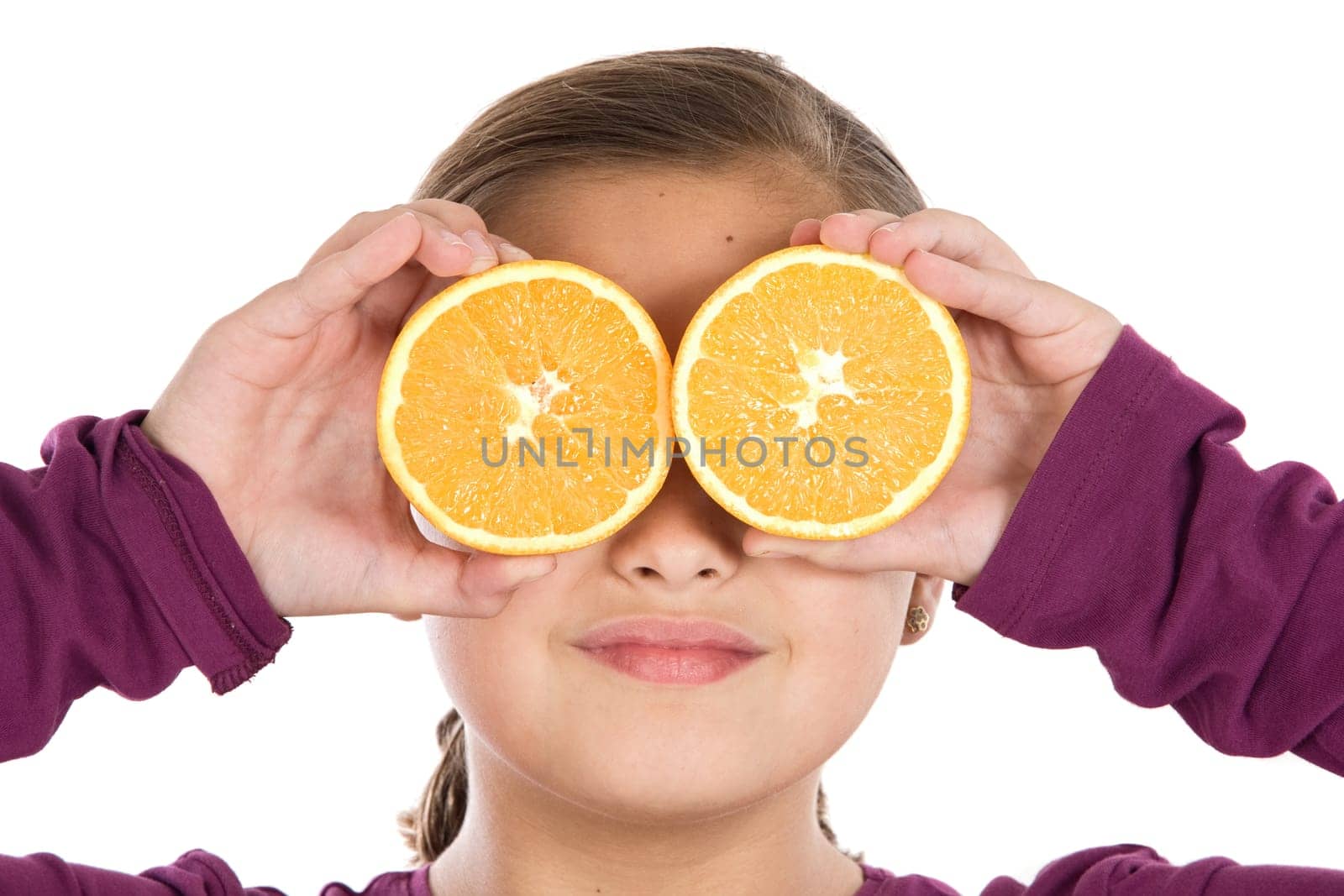 Attractive girl with oranges