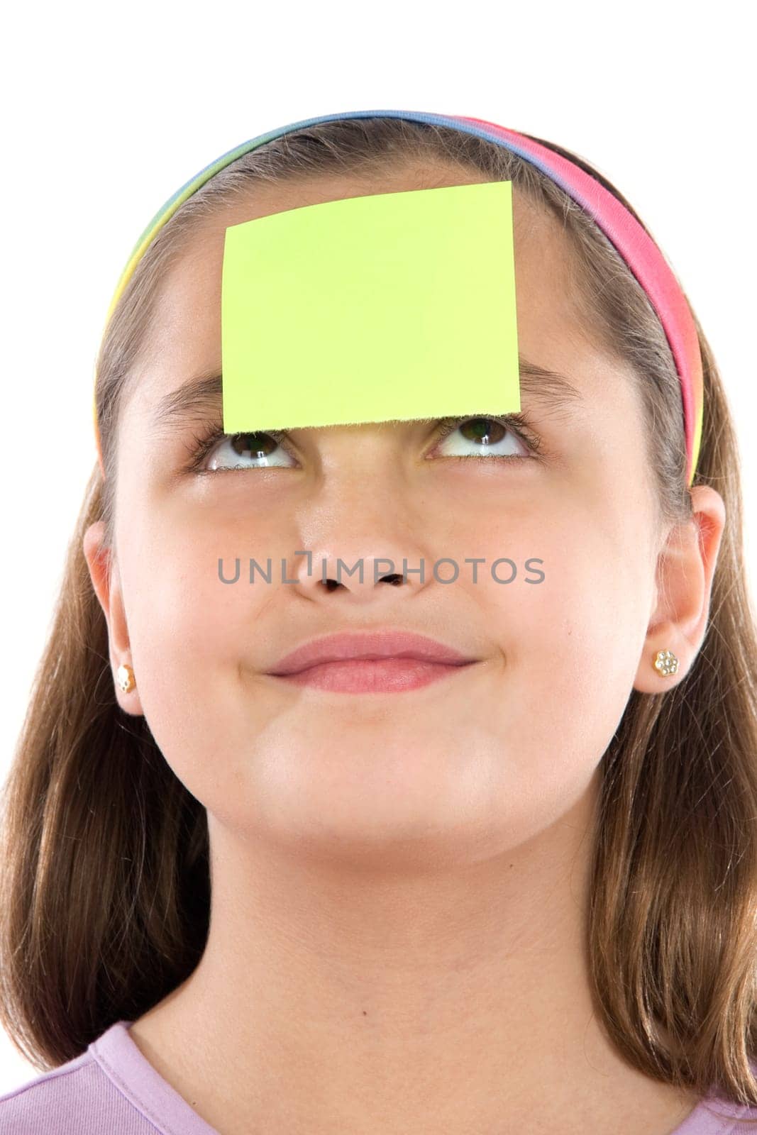 Adorable girl with post-it in her front