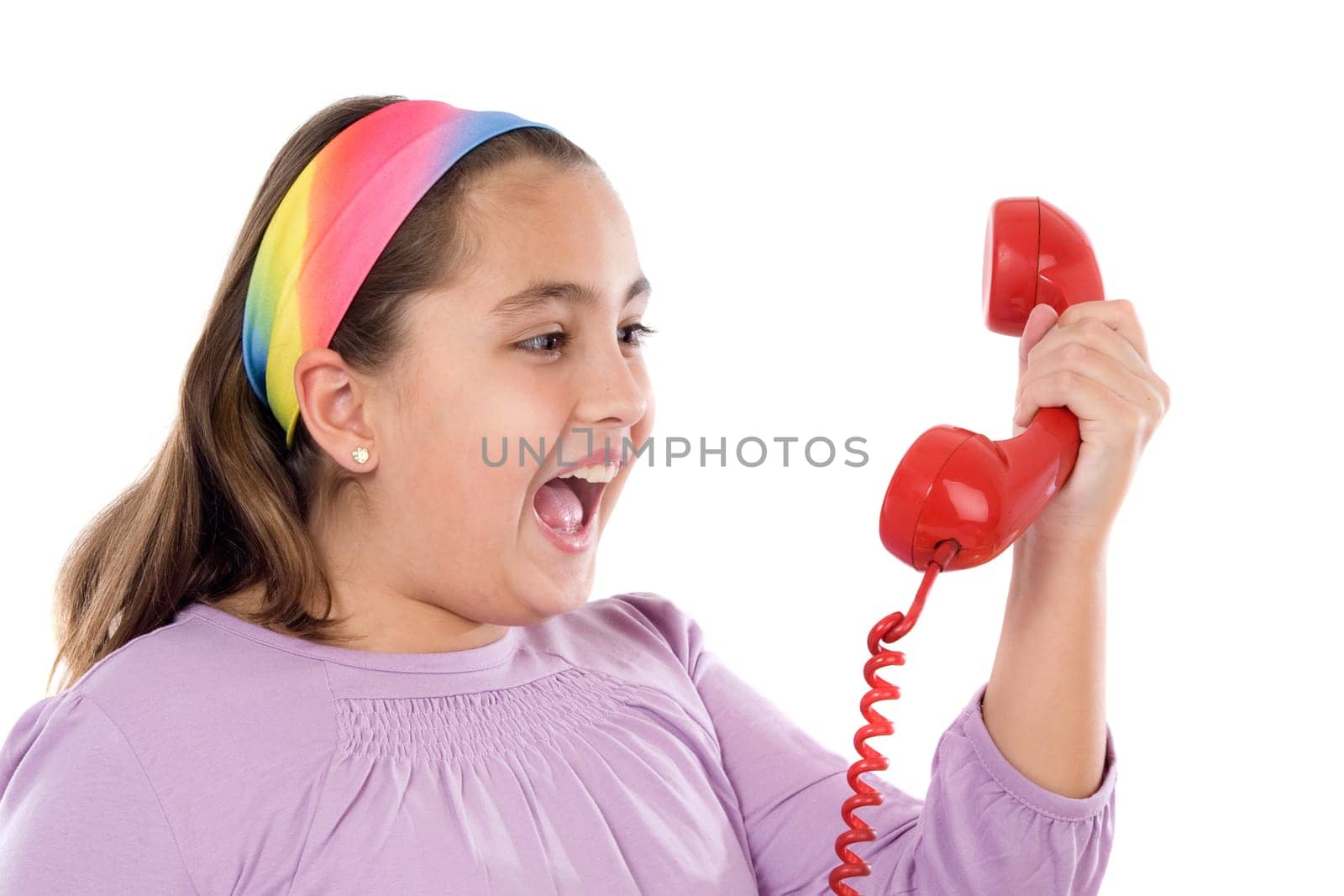Happy girl with red telephone