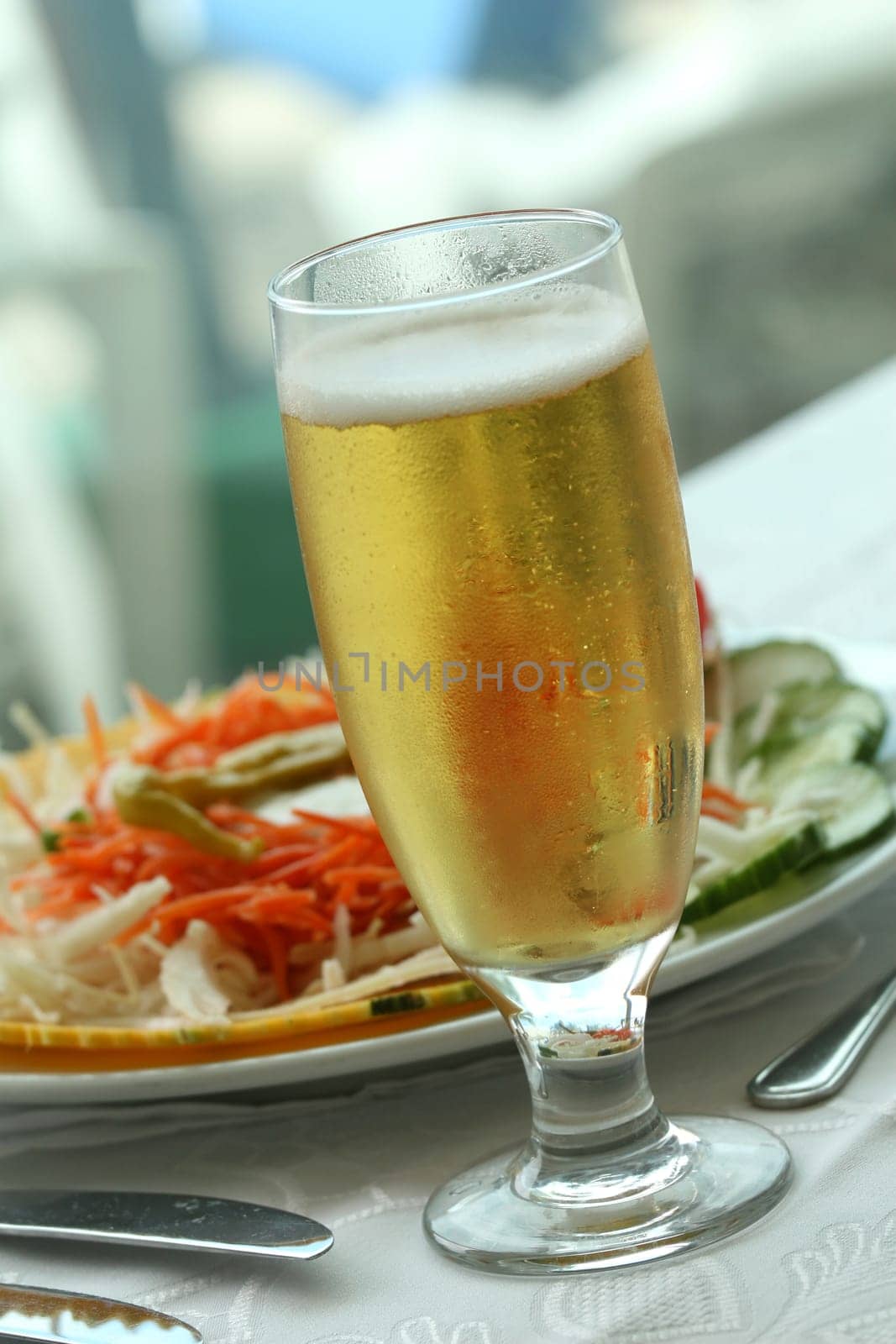Salad and glass of beer