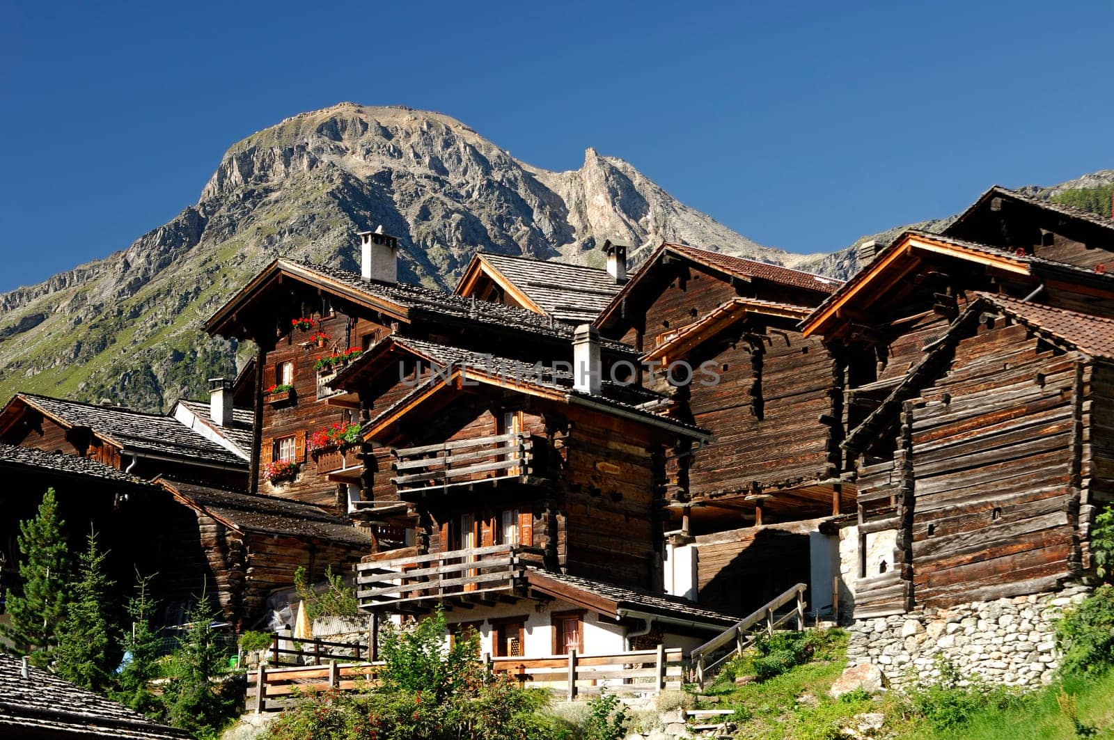 Typical sun-tanned Valais chalets and granaries in Grimentz,Valais,Schw
