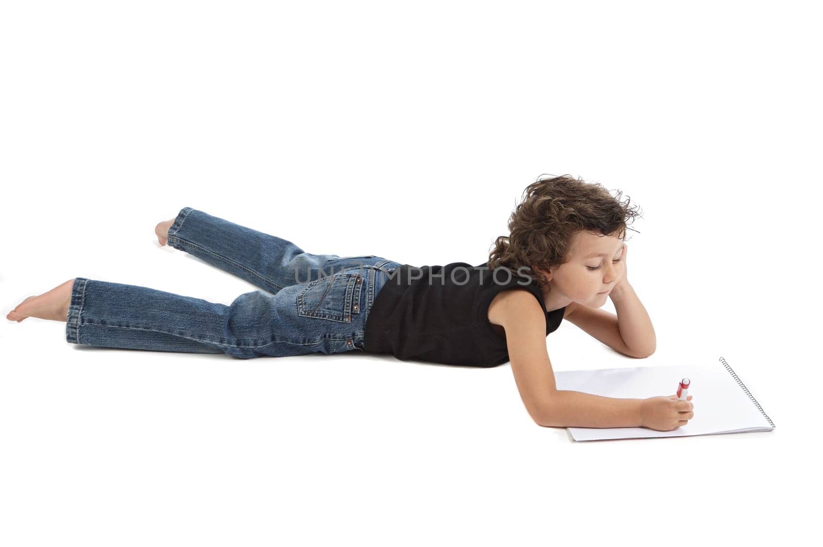 adorable boy writing