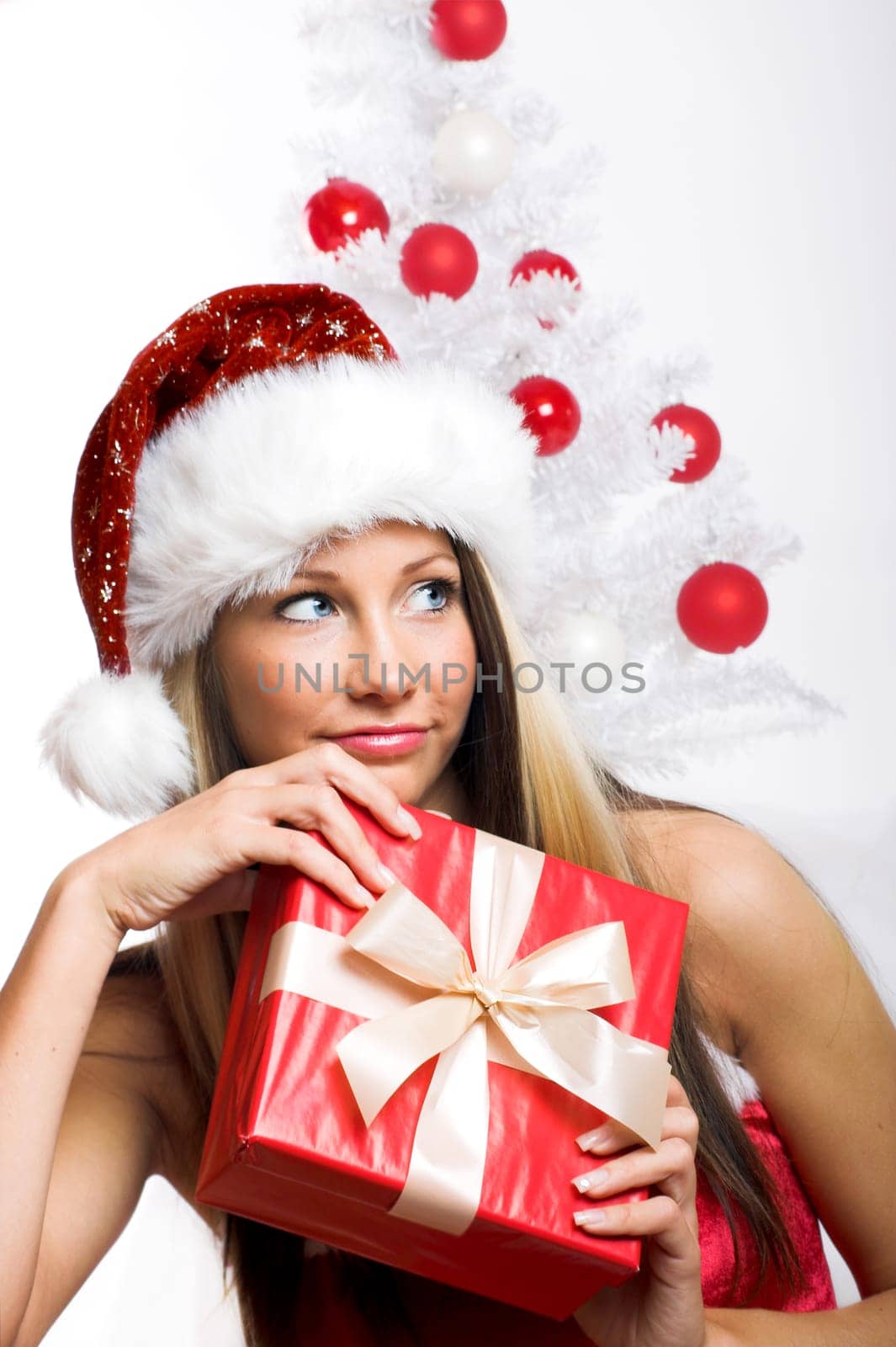 laughing santa claus with gift