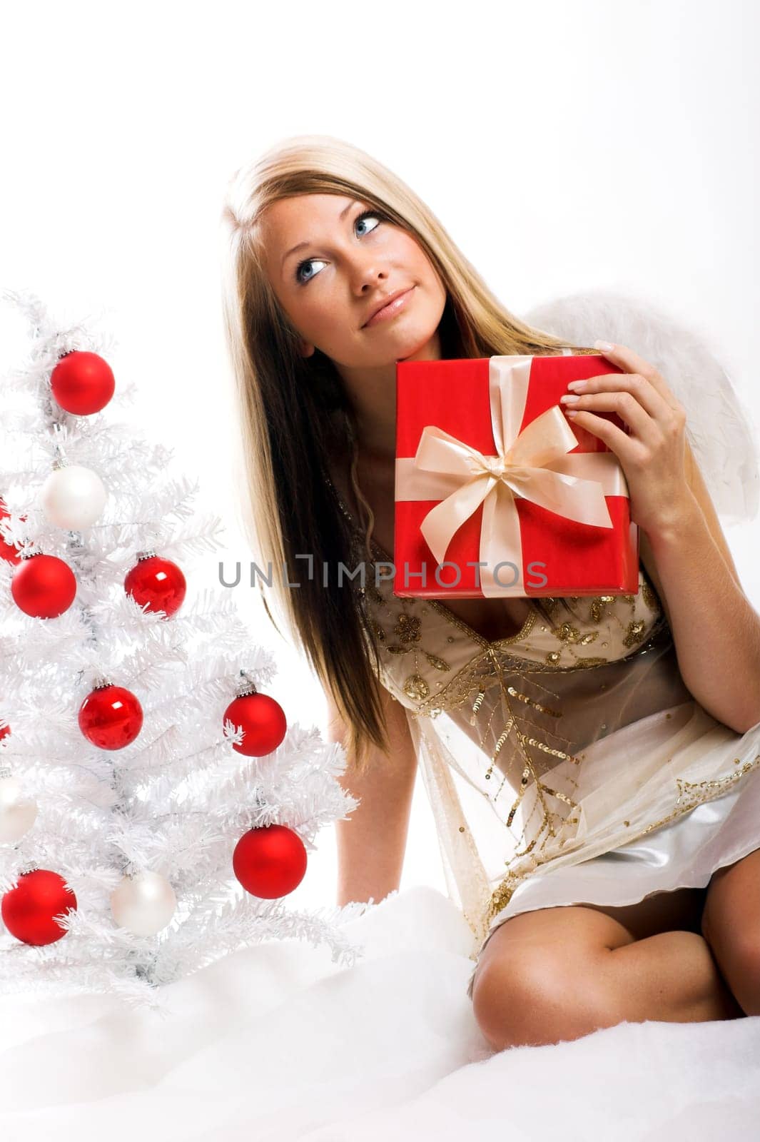 laughing angel with gift
