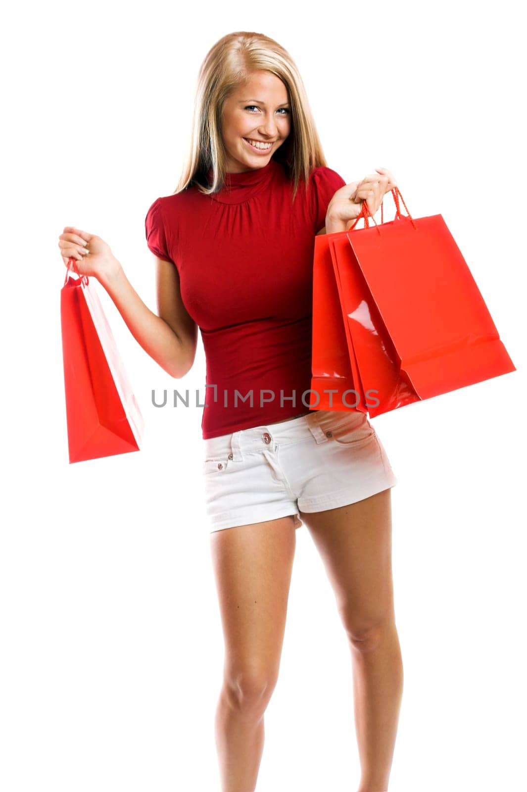 laughing woman with shopping bags