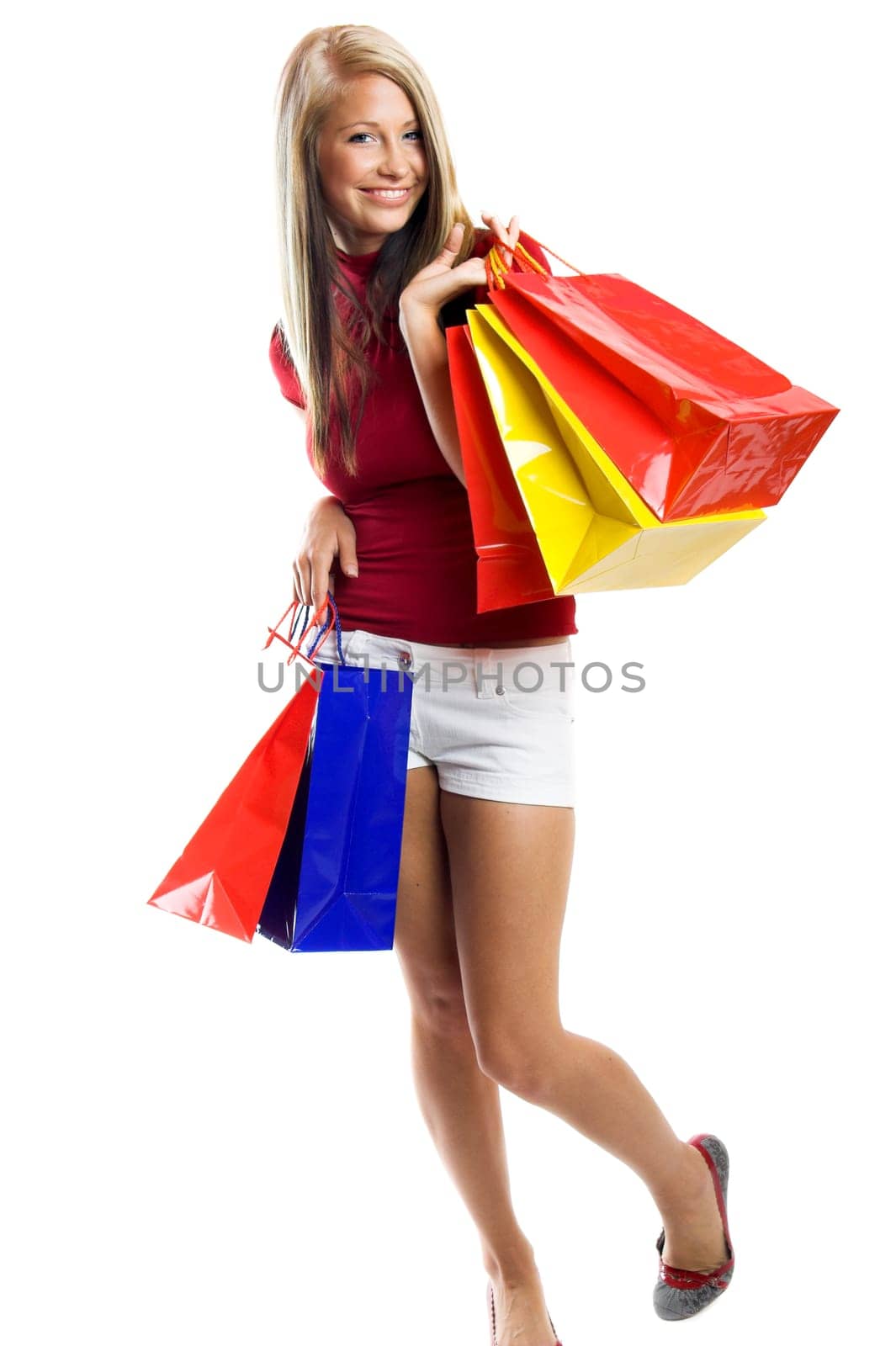 laughing woman with shopping bags
