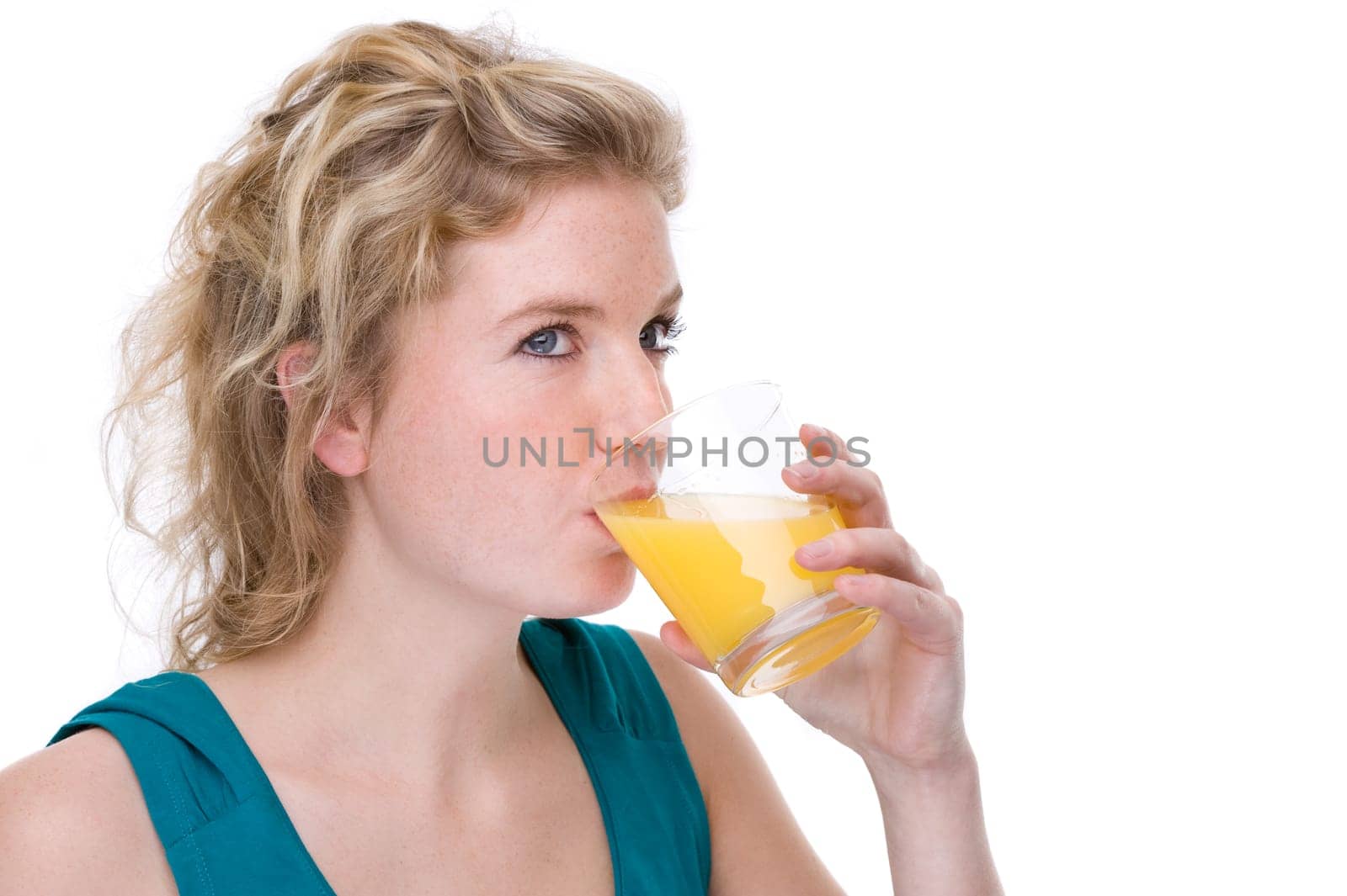 Young woman with glass of orange juice