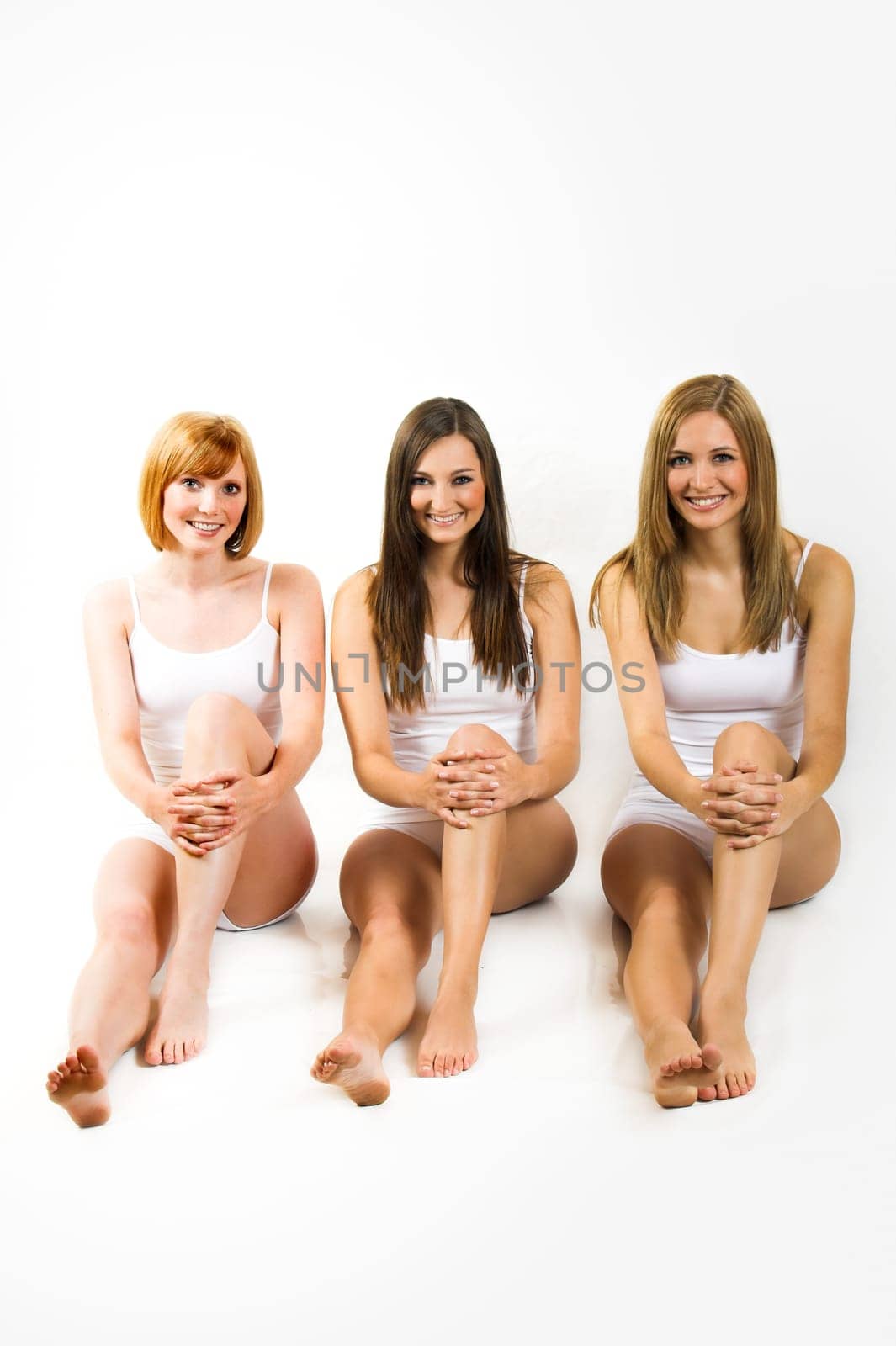 Three young women in white underwear
