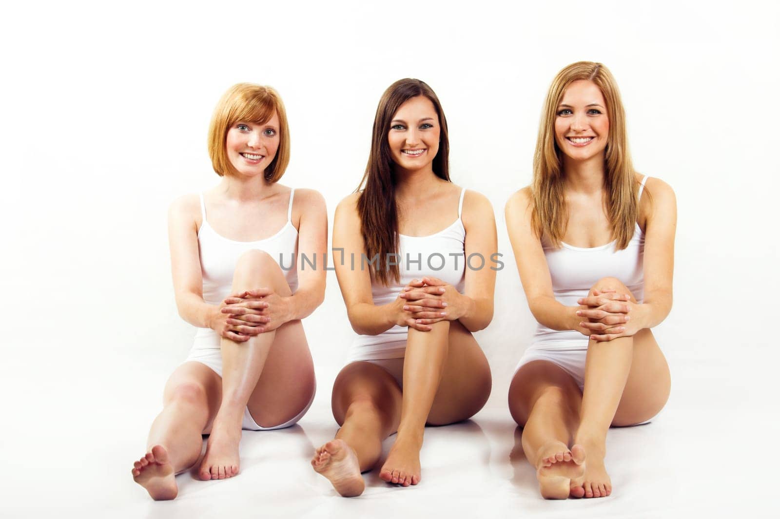 Three young women in white underwear