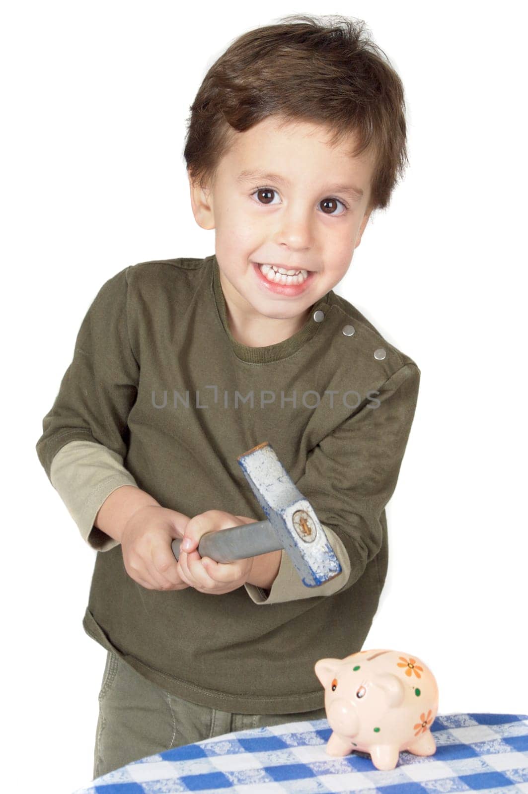 adorable boy breaking the money box