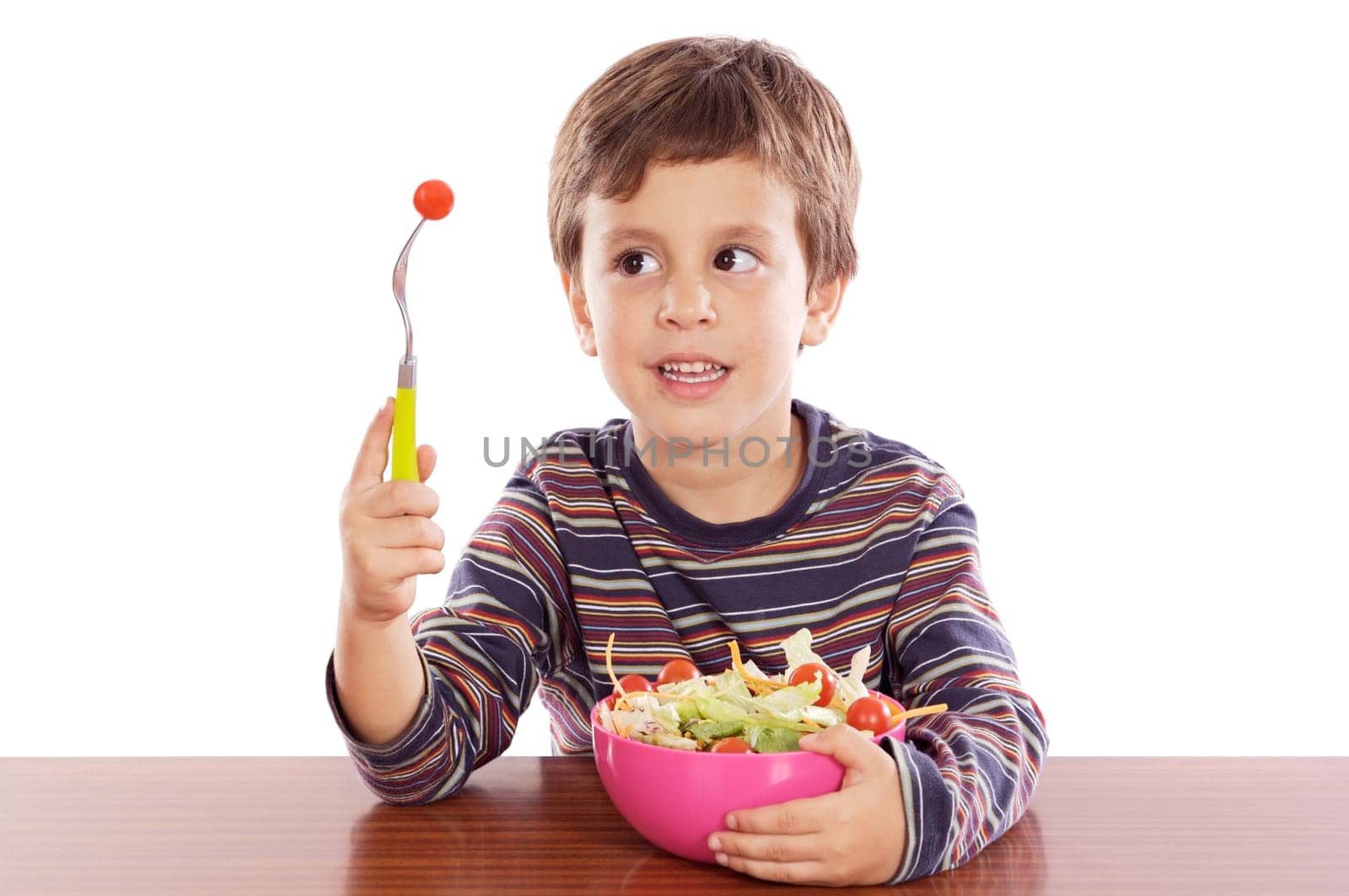 Child eating salad