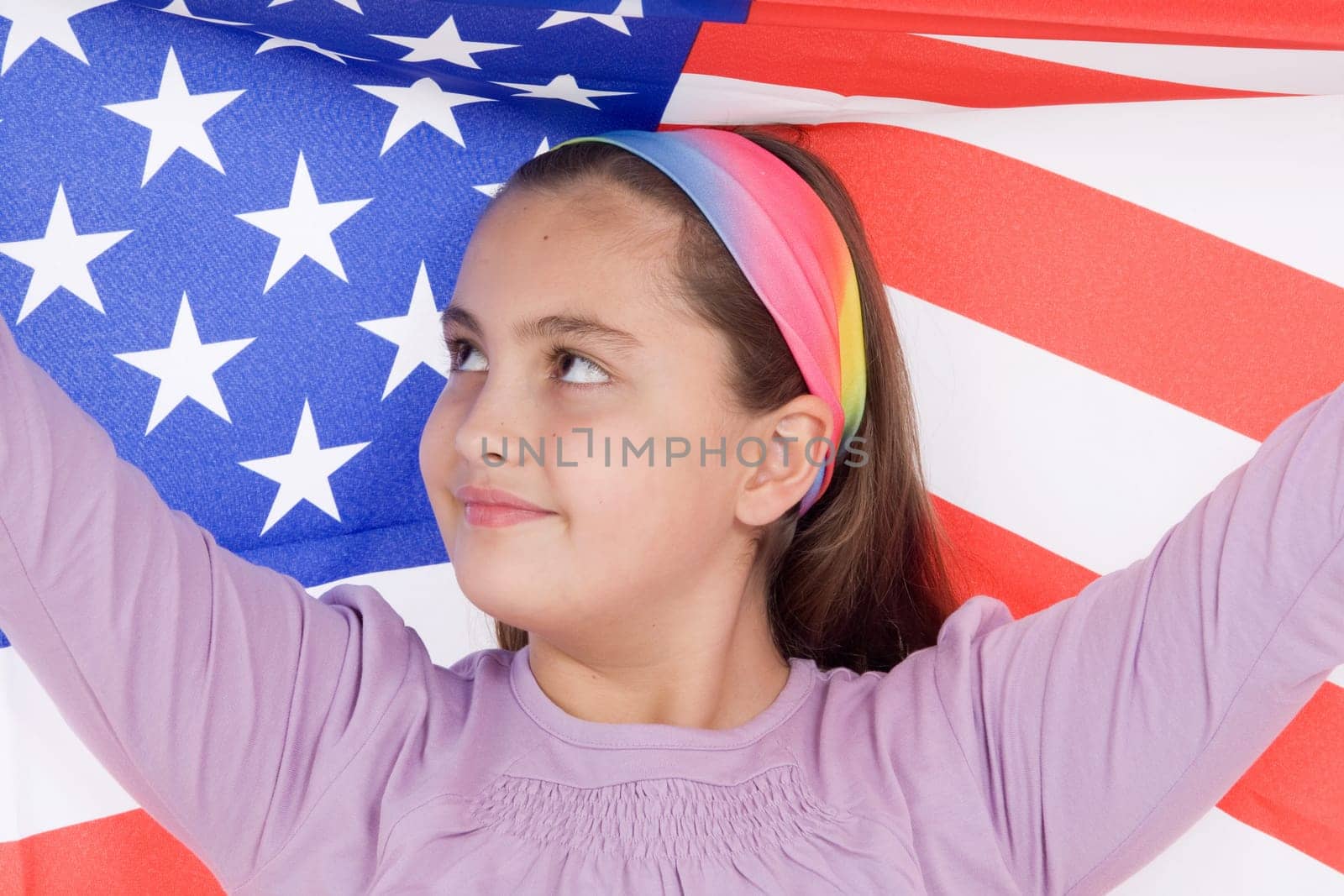 Attractive little girl playing chess